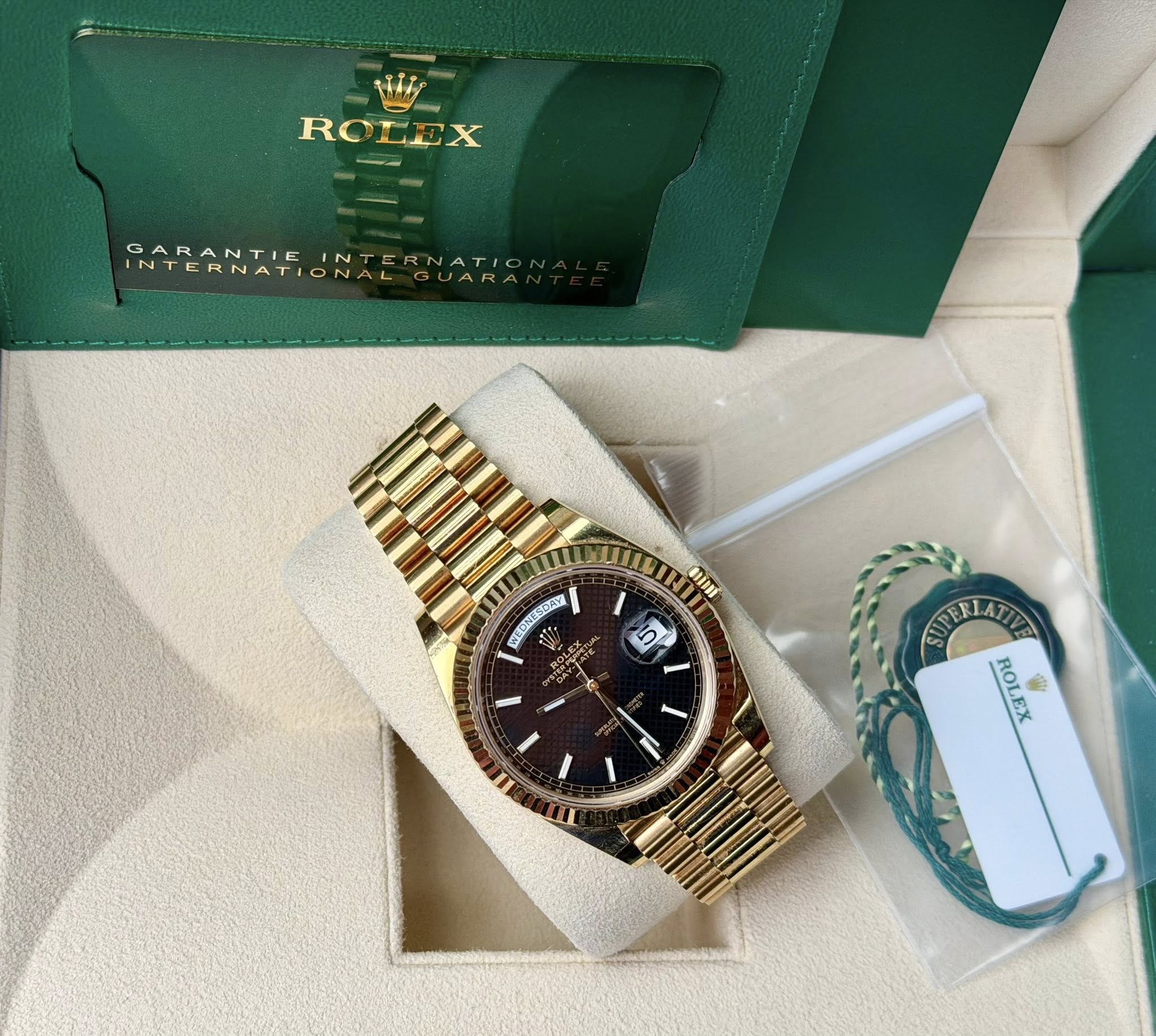 May be an image of wrist watch and text