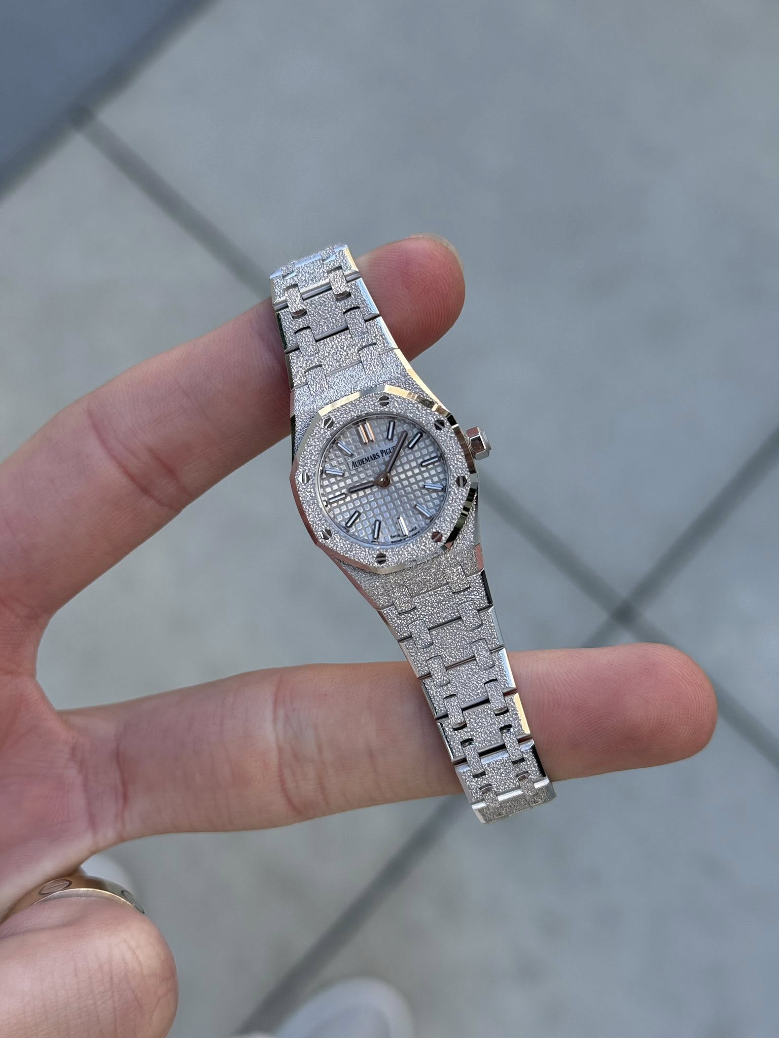 May be an image of wrist watch