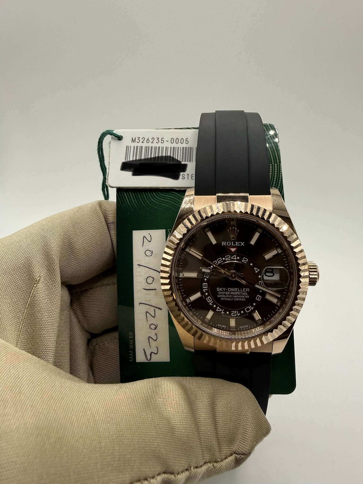 May be an image of wrist watch and text