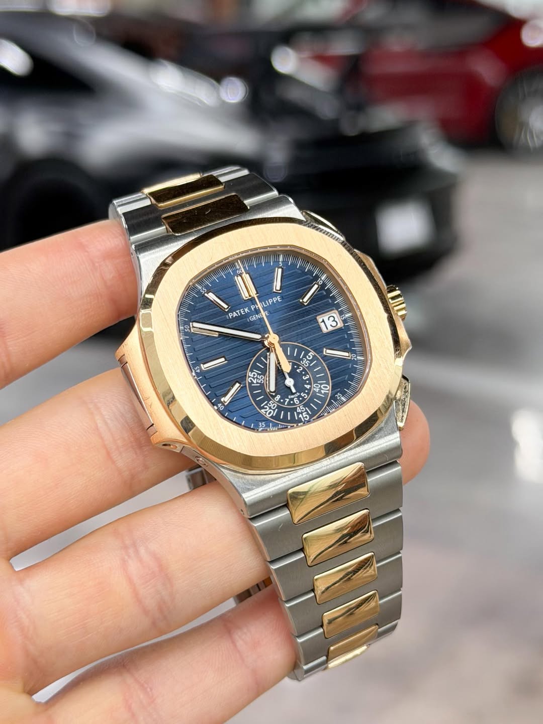 May be an image of wrist watch and text