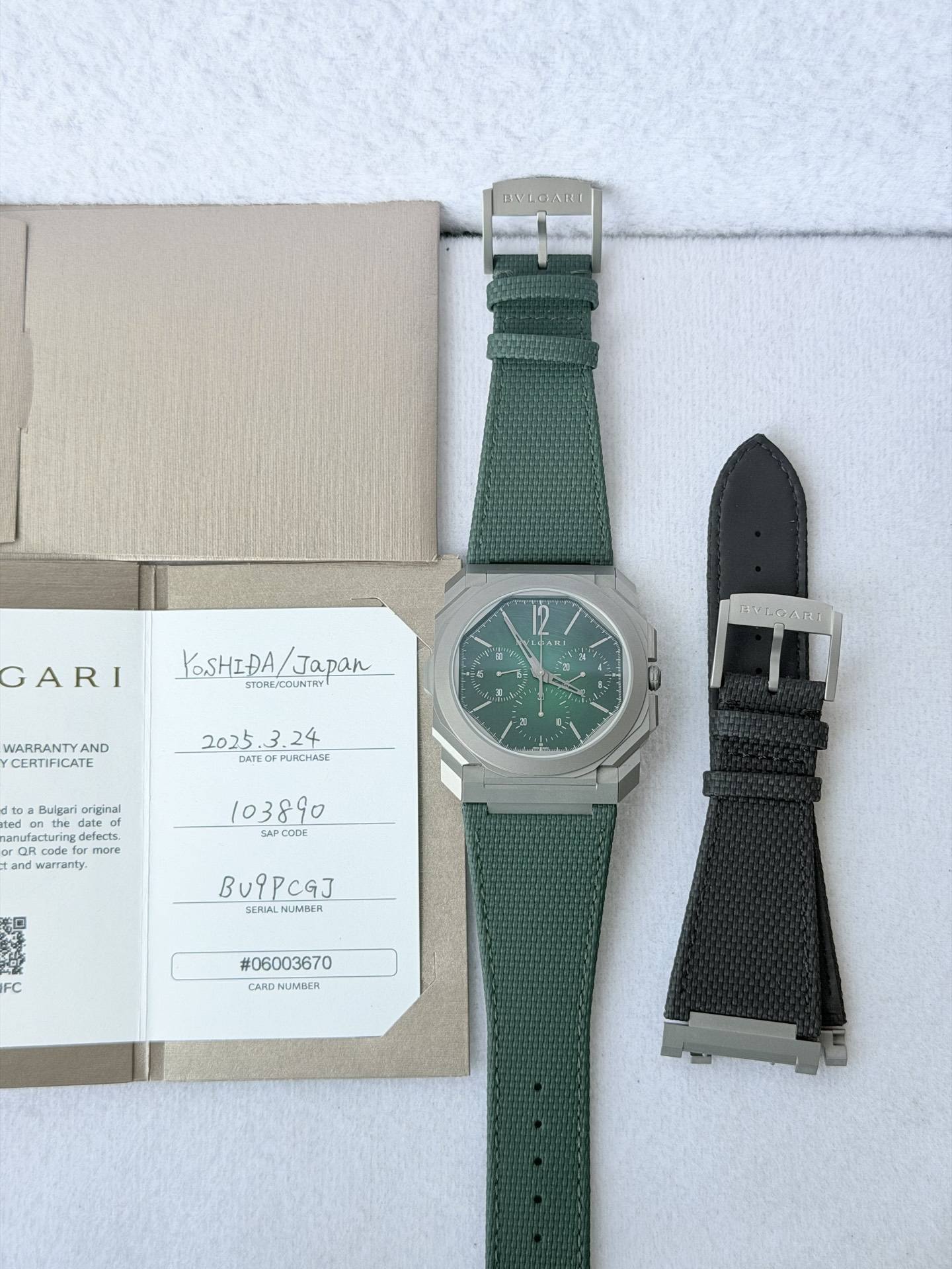 May be an image of digital watch and text that says 'DNEGAR GARI YoSHIĐA/Japan YOSHIĐA Japan STORE/COUNTRY .ΘΑΚΙ හීී WARRANTYAND AND CERTIFICATE #eLCART DATEOFPUNCHASE PUNCHASE…