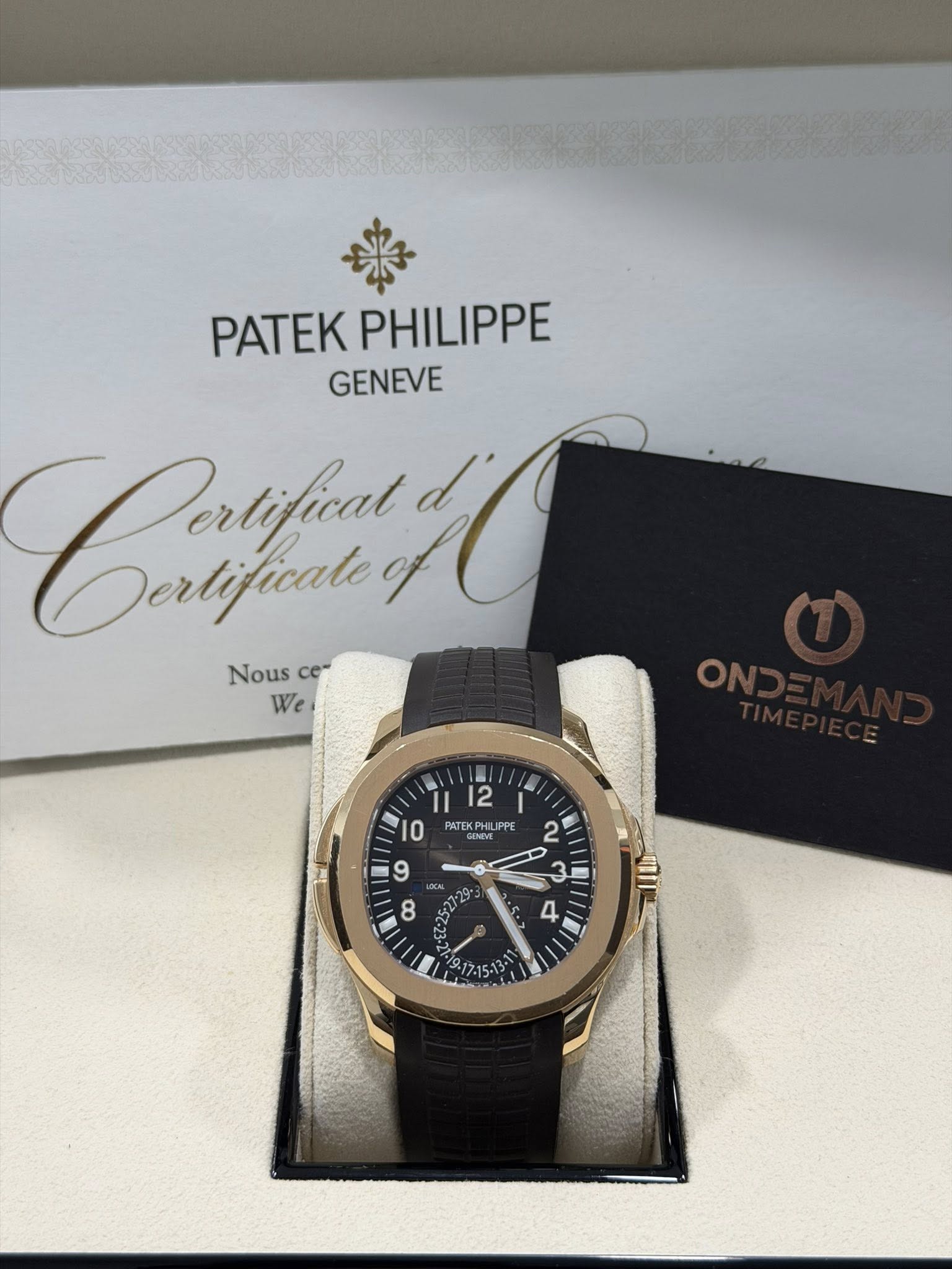 May be an image of wrist watch and text that says 'PATEK PATEKPHILIPPE PHILIPPE GENEVE Crtfuny Dertifiat d Dertificale Nous Nousce ce" We PNTEKPHUPPE PATEH PPE 2 9 3i '