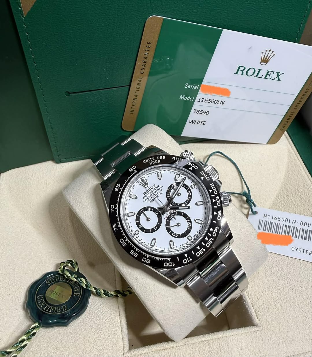 May be an image of wrist watch and text that says 'ROLEX Serial Model116500LN Model 116500LN 78590 WHITE UNITS PER s0 S5 400 富心街 草袋美 မ0ဆ O ว้ G 1 20 0V Y 0 80 e NAONINLIE…