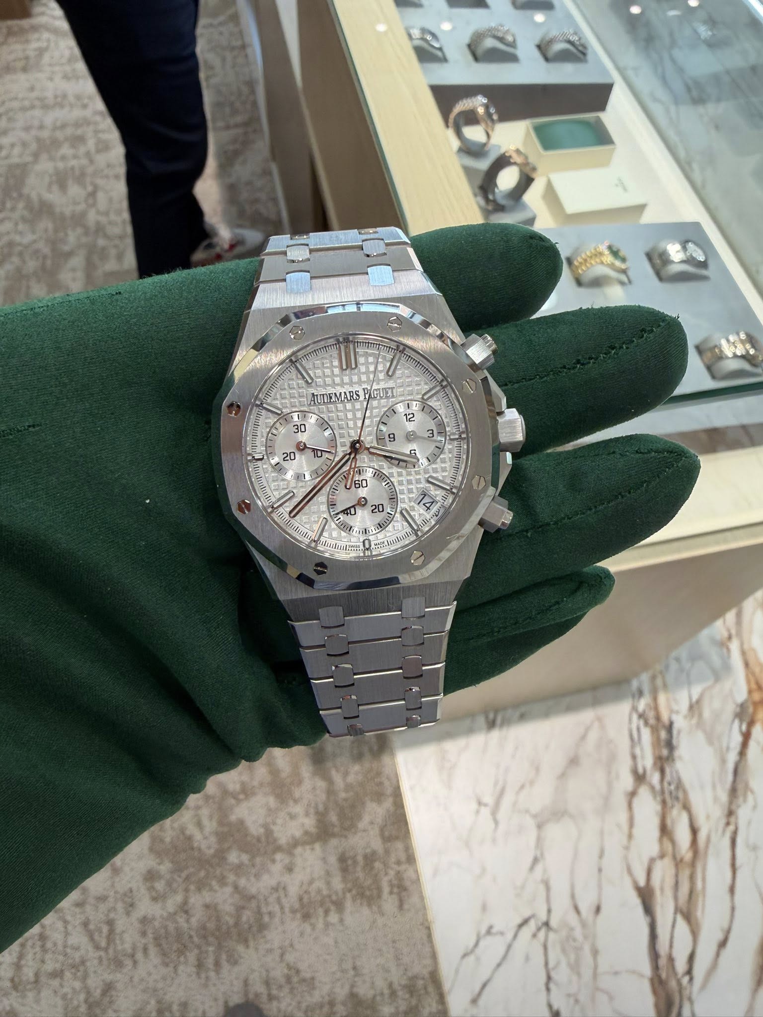 May be an image of wrist watch and text
