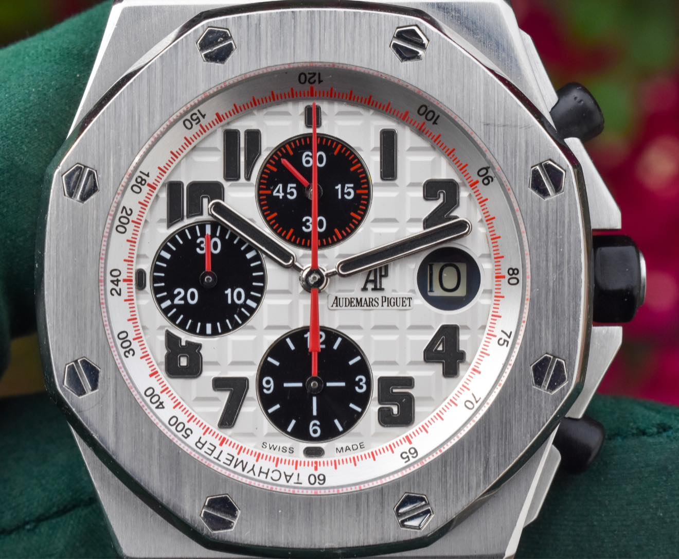 May be an image of wrist watch and text