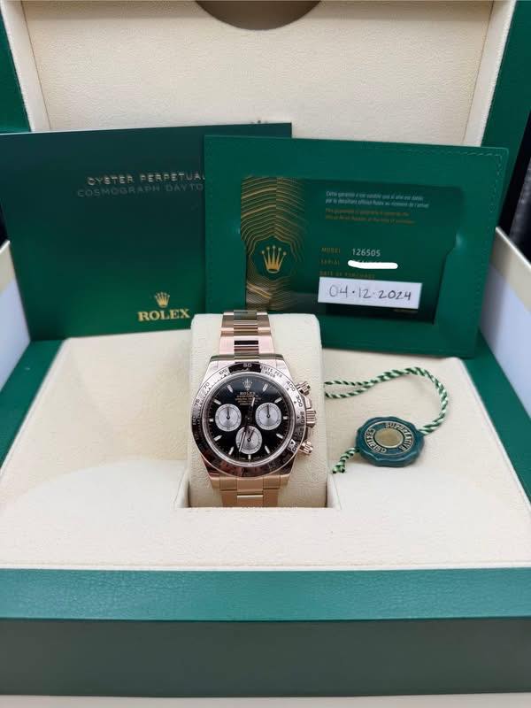 May be an image of wrist watch and text that says 'CERPET 126505 ROL ROLEX 量 A'