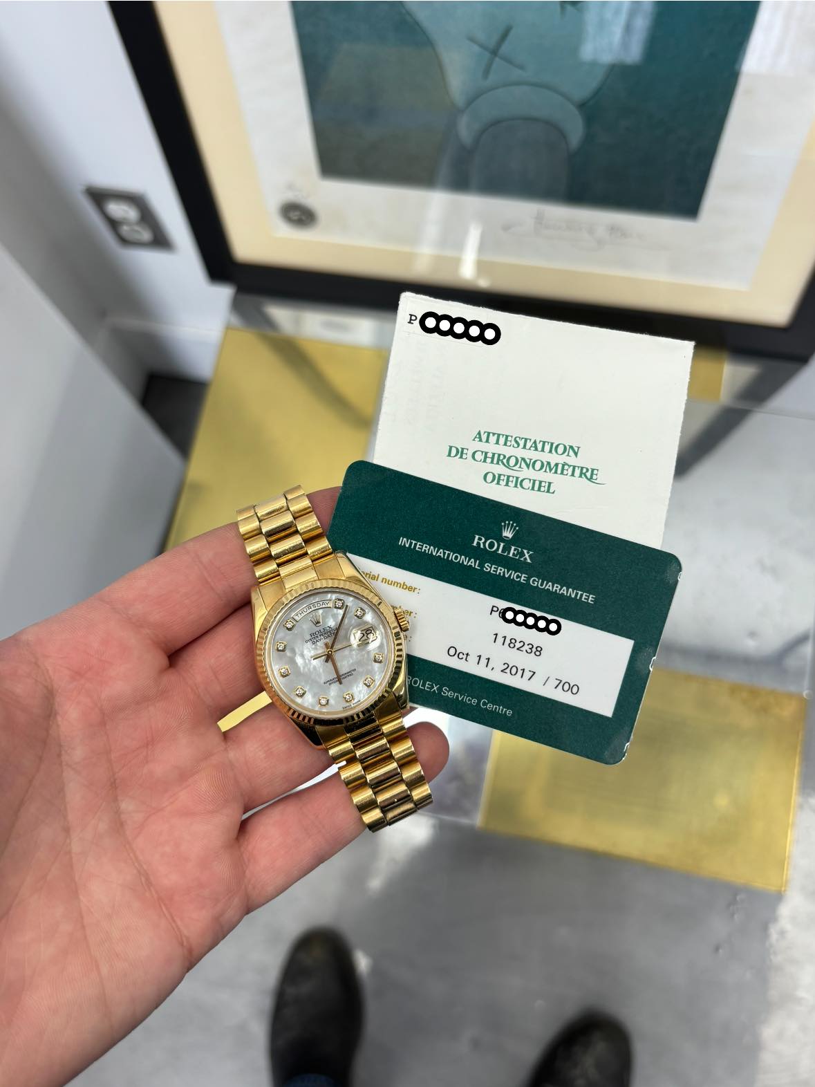 May be an image of wrist watch and text that says 'P .ထ..ထ DE DECHRONOMETRE ATTESTATION OFFICIEL 安 車 5351 نادب Gj فم INTERNATIONAL ROLEX M എනി muamber SERVICE GUARANTEE P.......…