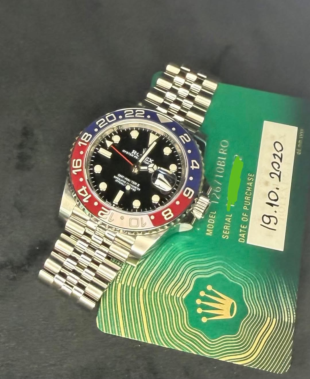 May be an image of wrist watch and text