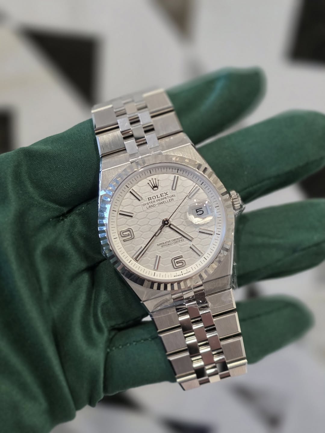 May be an image of wrist watch and text