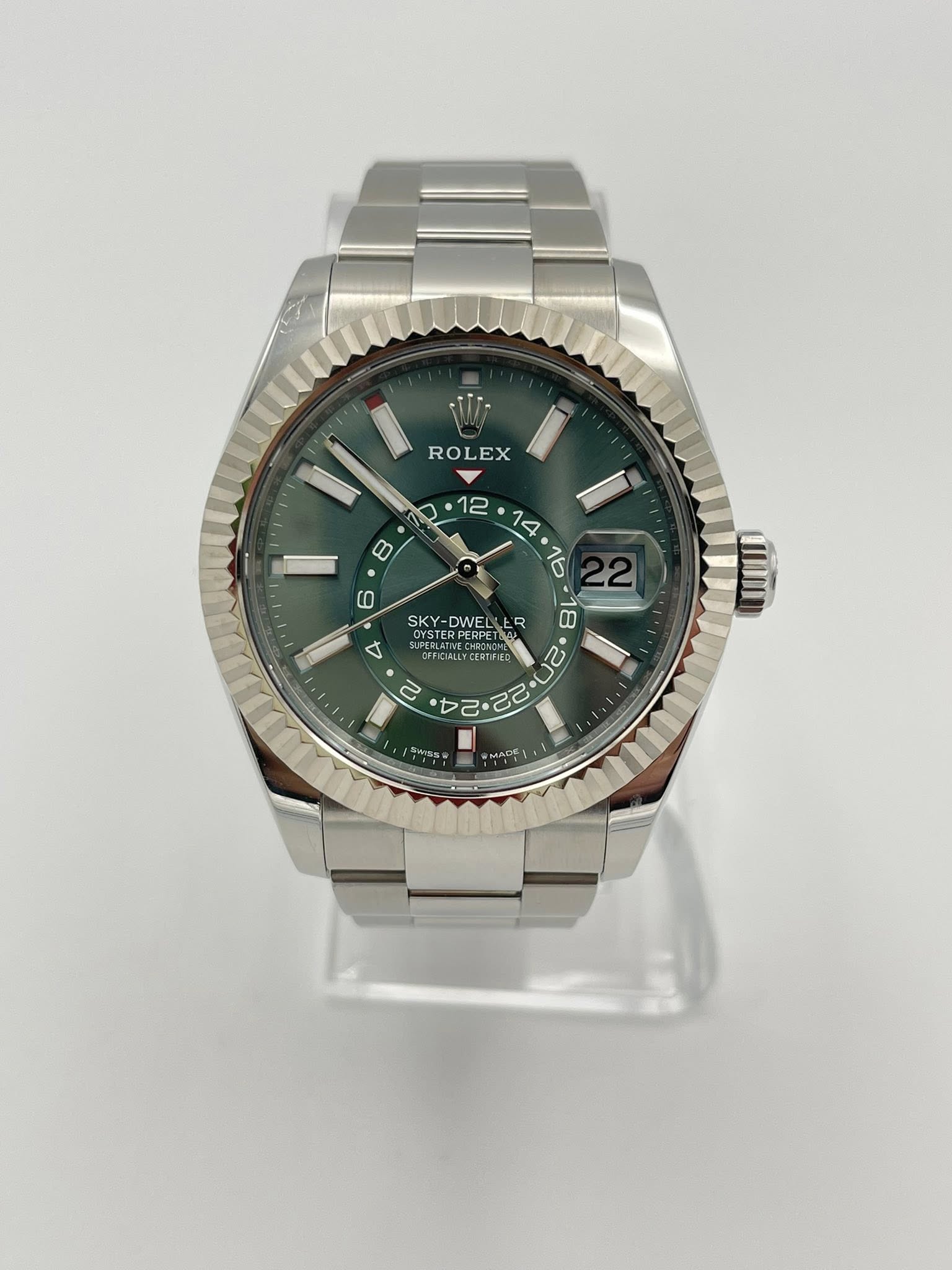 May be an image of wrist watch and text