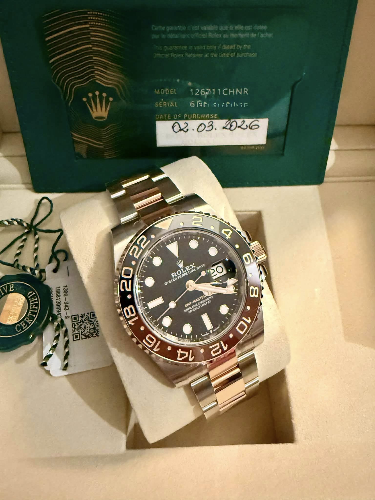 May be an image of wrist watch and text