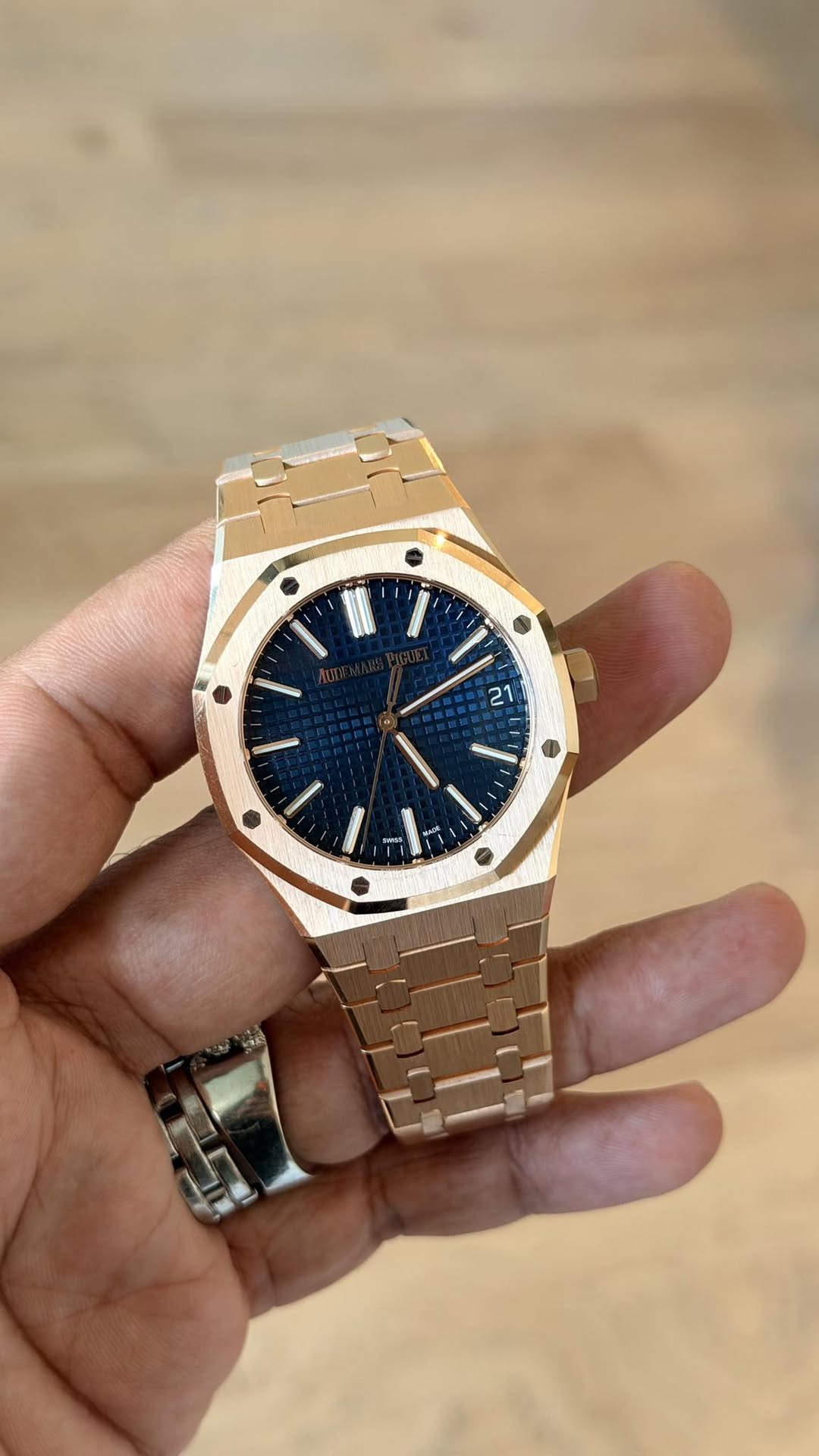 May be an image of wrist watch and text