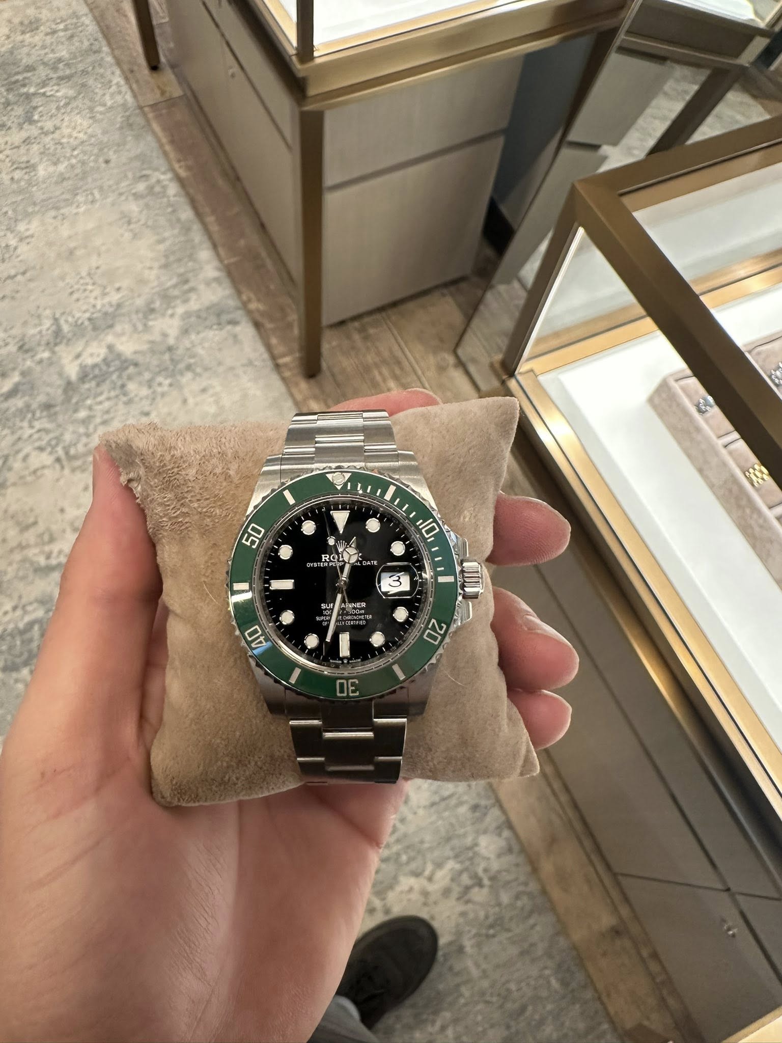 May be an image of wrist watch and text