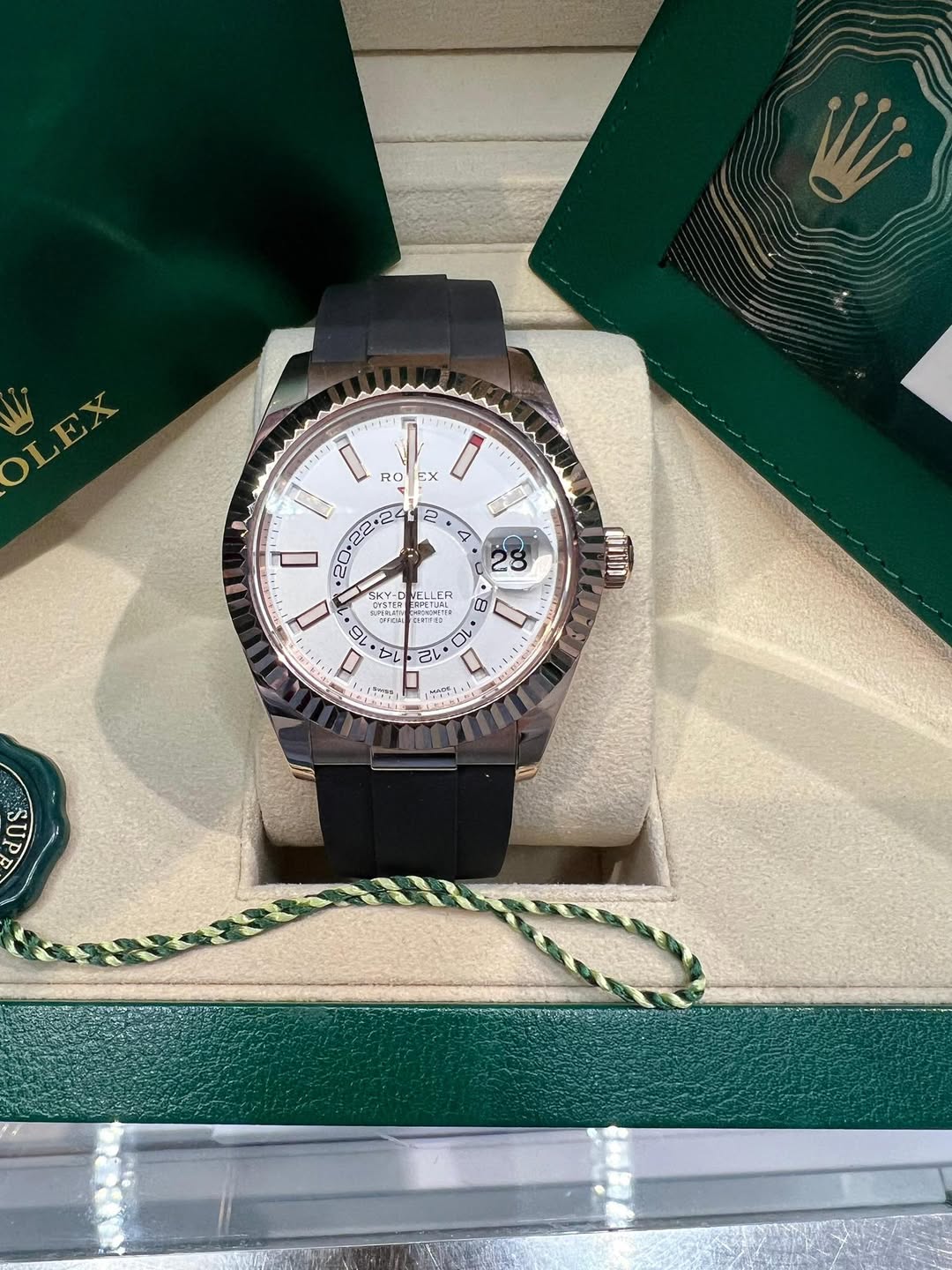 May be an image of wrist watch and text