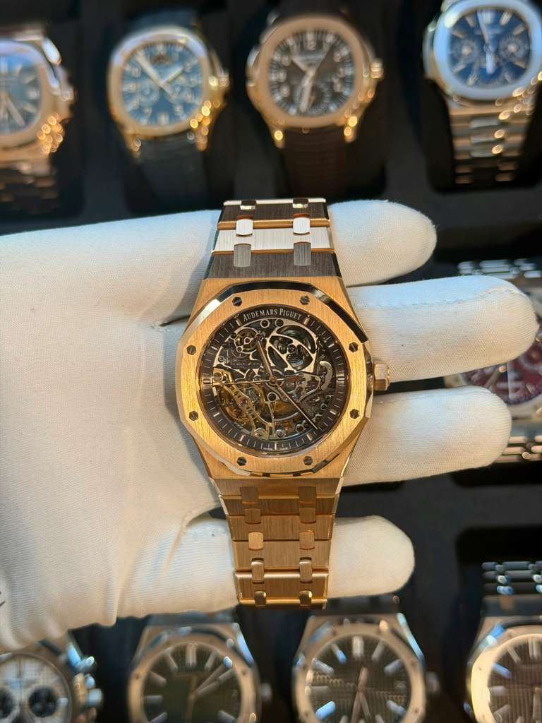May be an image of wrist watch and text