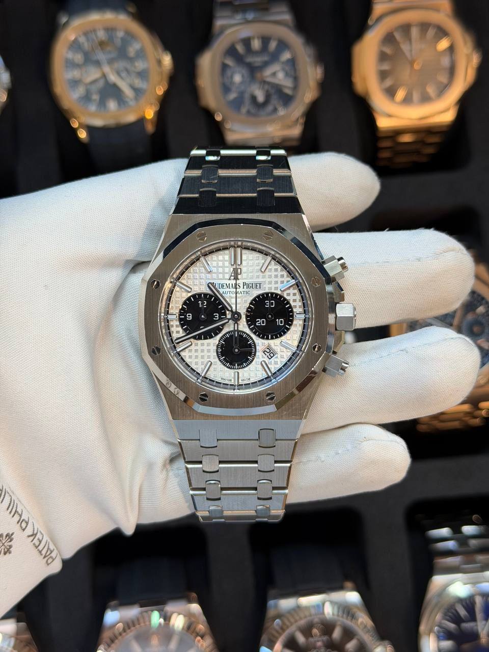 May be an image of wrist watch and text