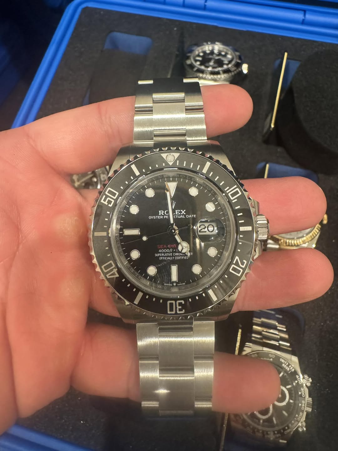 May be an image of wrist watch and text
