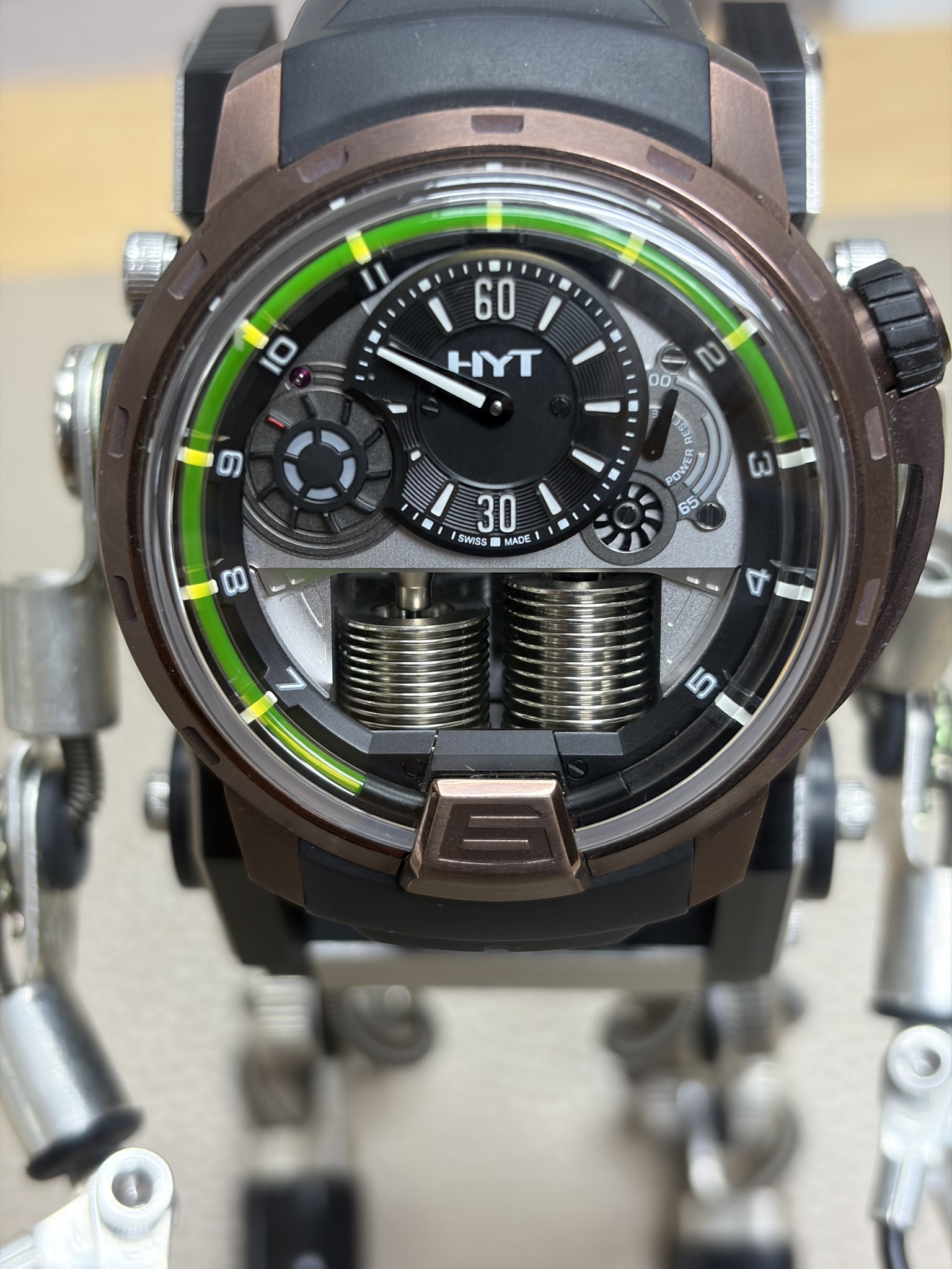 May be an image of digital watch and text that says '"1 10 60 HYT 3 の 00 ប្នេនម OWVER فى ለ 30 SWISS MADE 00'