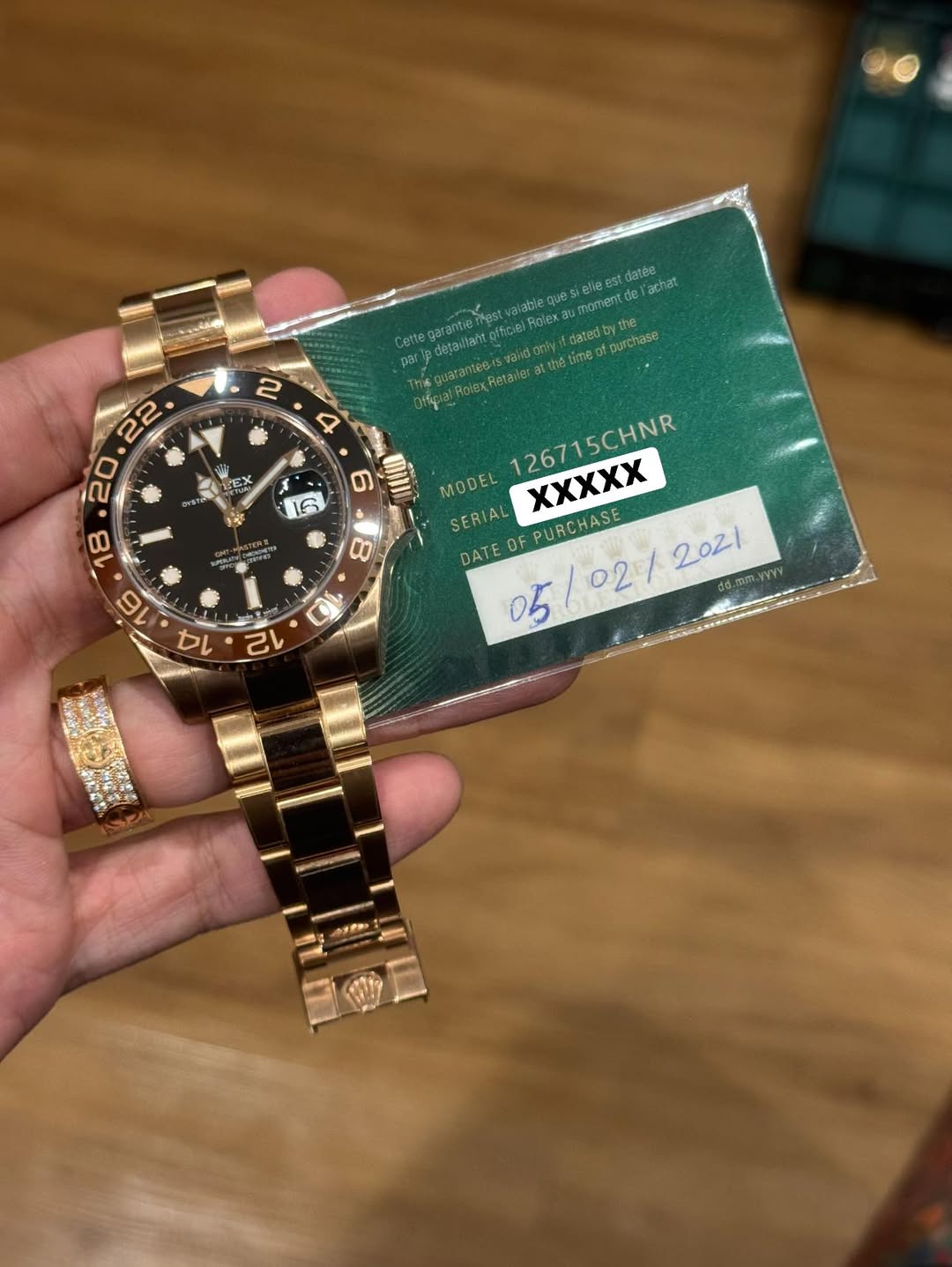 May be an image of wrist watch and text