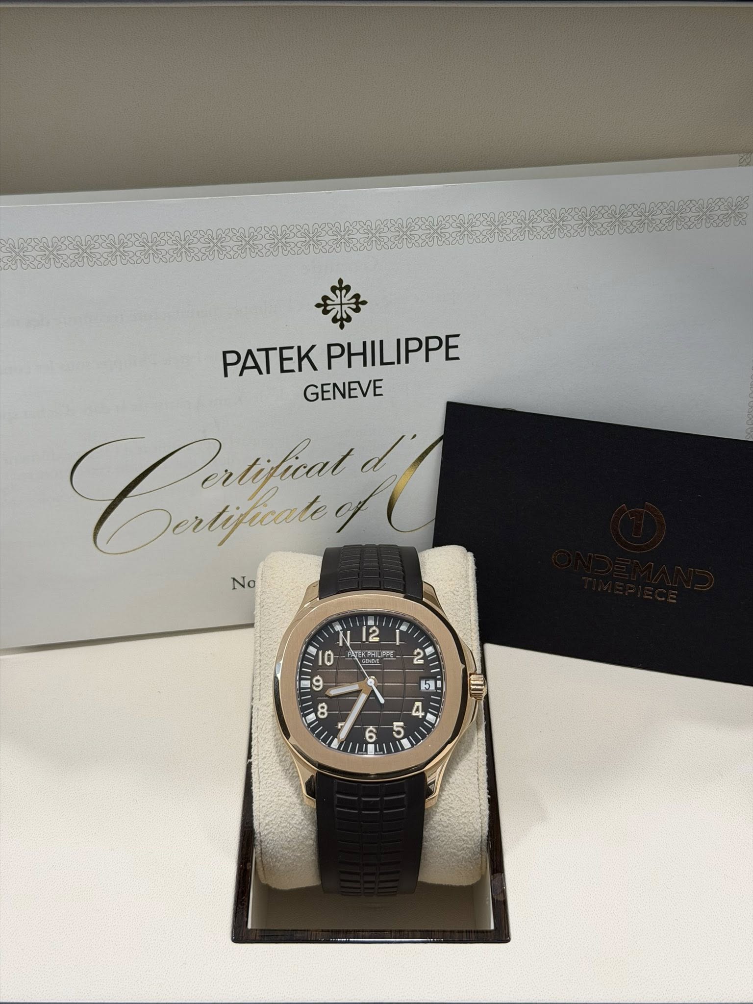 May be an image of wrist watch and text that says '楽 PATEK PATEKPHILIPPE PHILIPPE GENEVE Calfur d' Sertificated No 12 N12 L 2 10 TR PASLA LPE 2 9 8 MII 50 4 5 ㅎ'