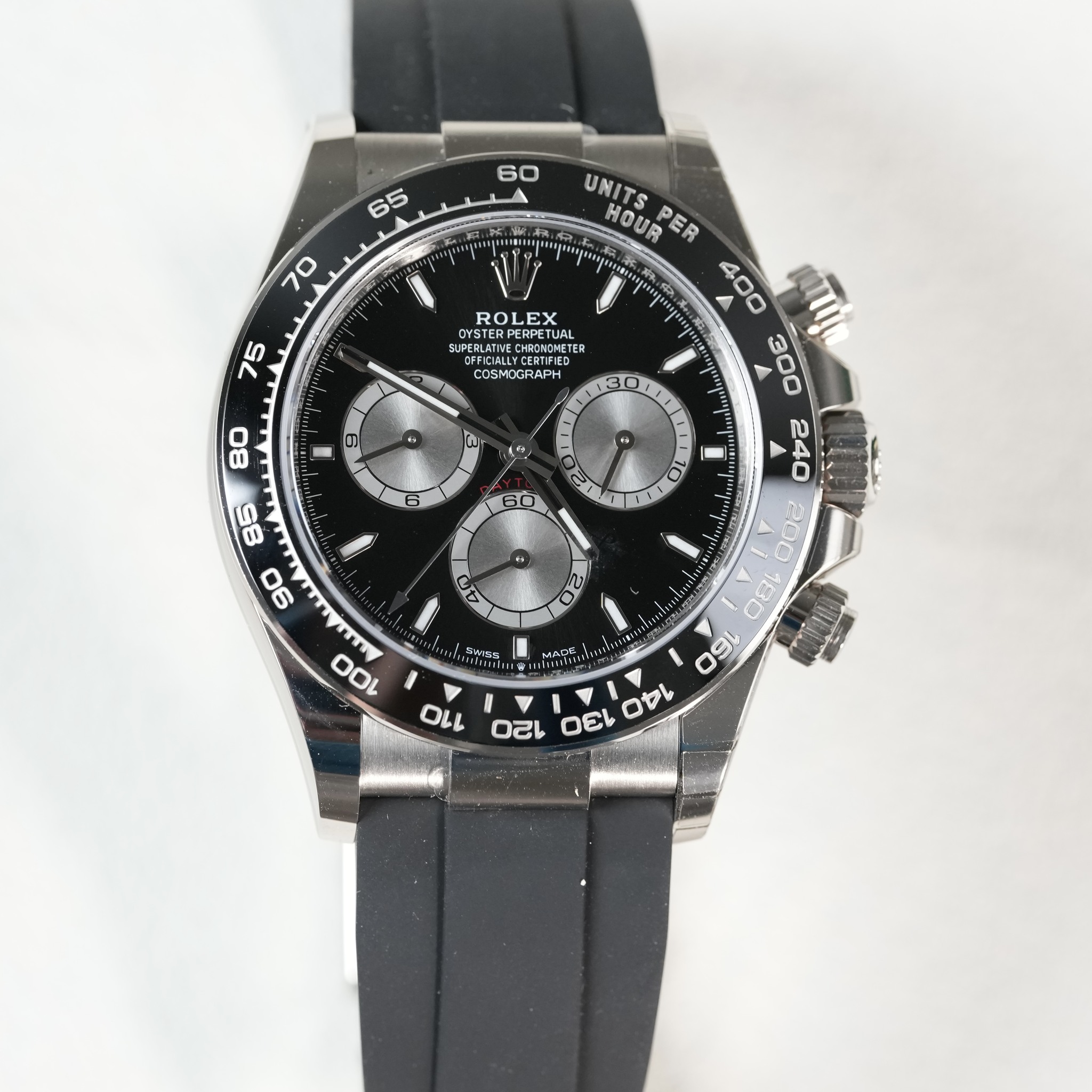 May be an image of wrist watch and text