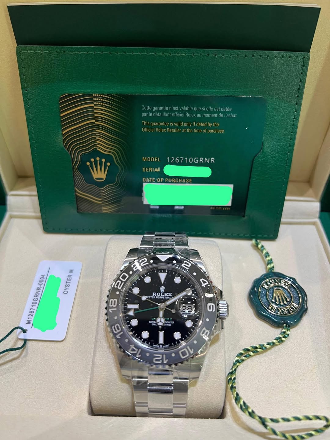 May be an image of wrist watch and text