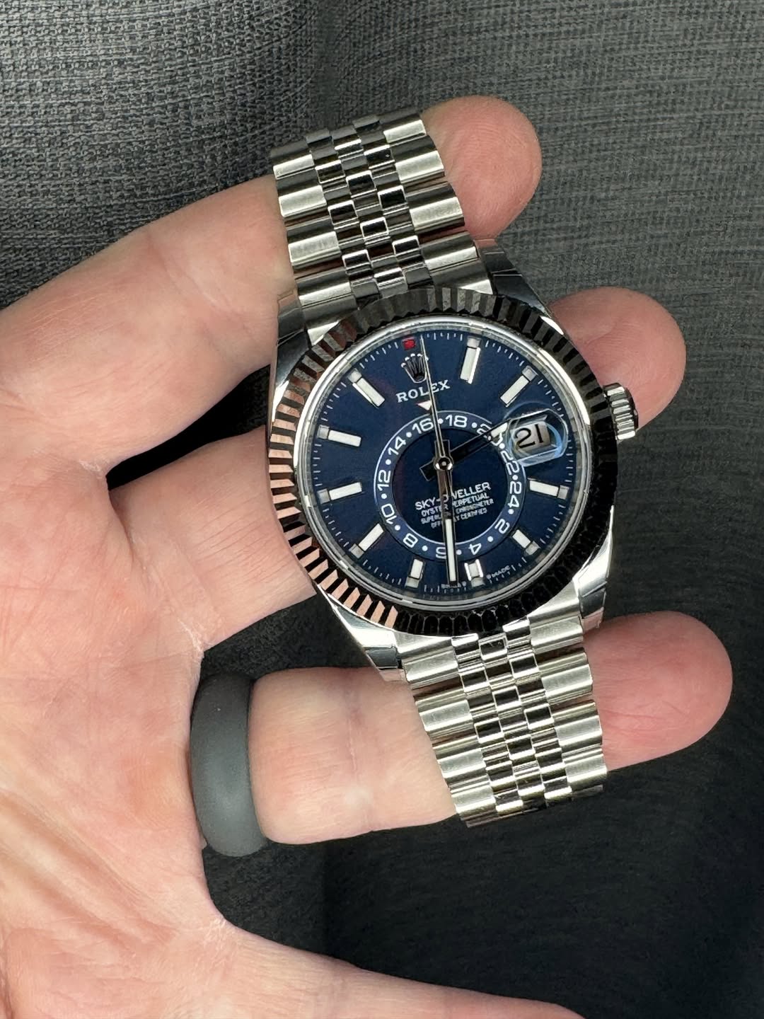 May be an image of wrist watch and text