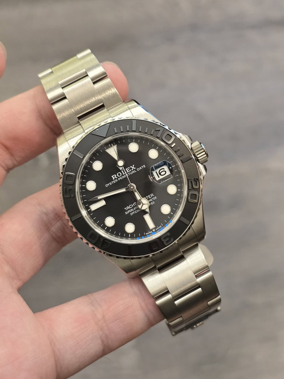May be an image of wrist watch and text