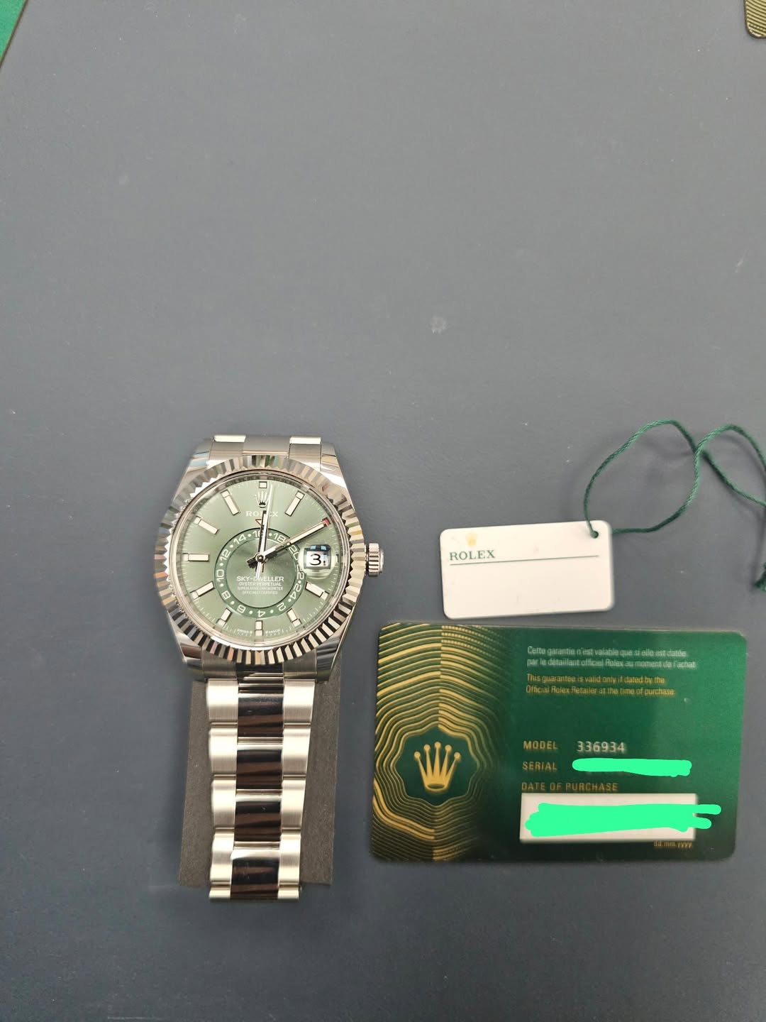 May be an image of wrist watch and text