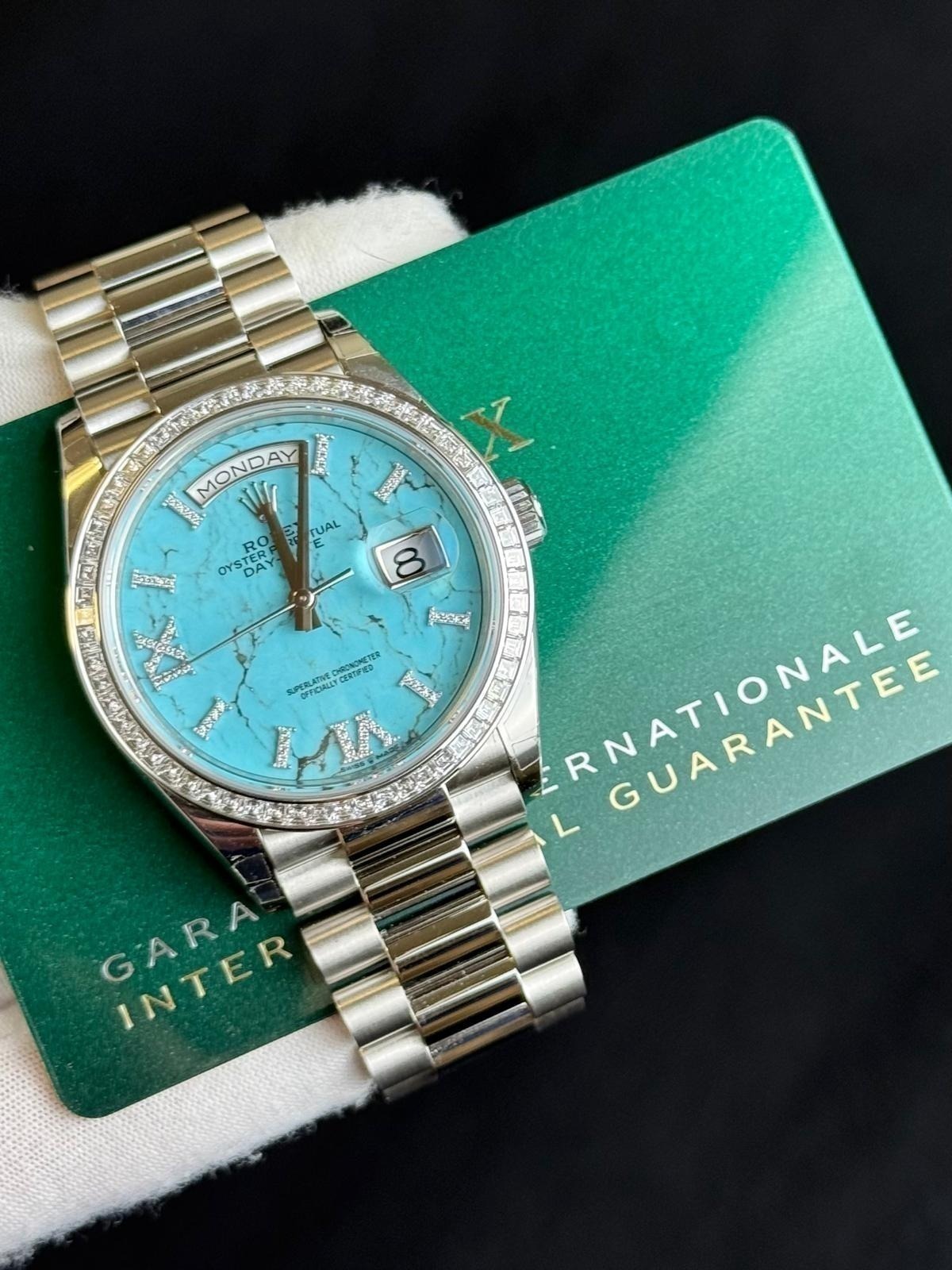 May be an image of wrist watch and text