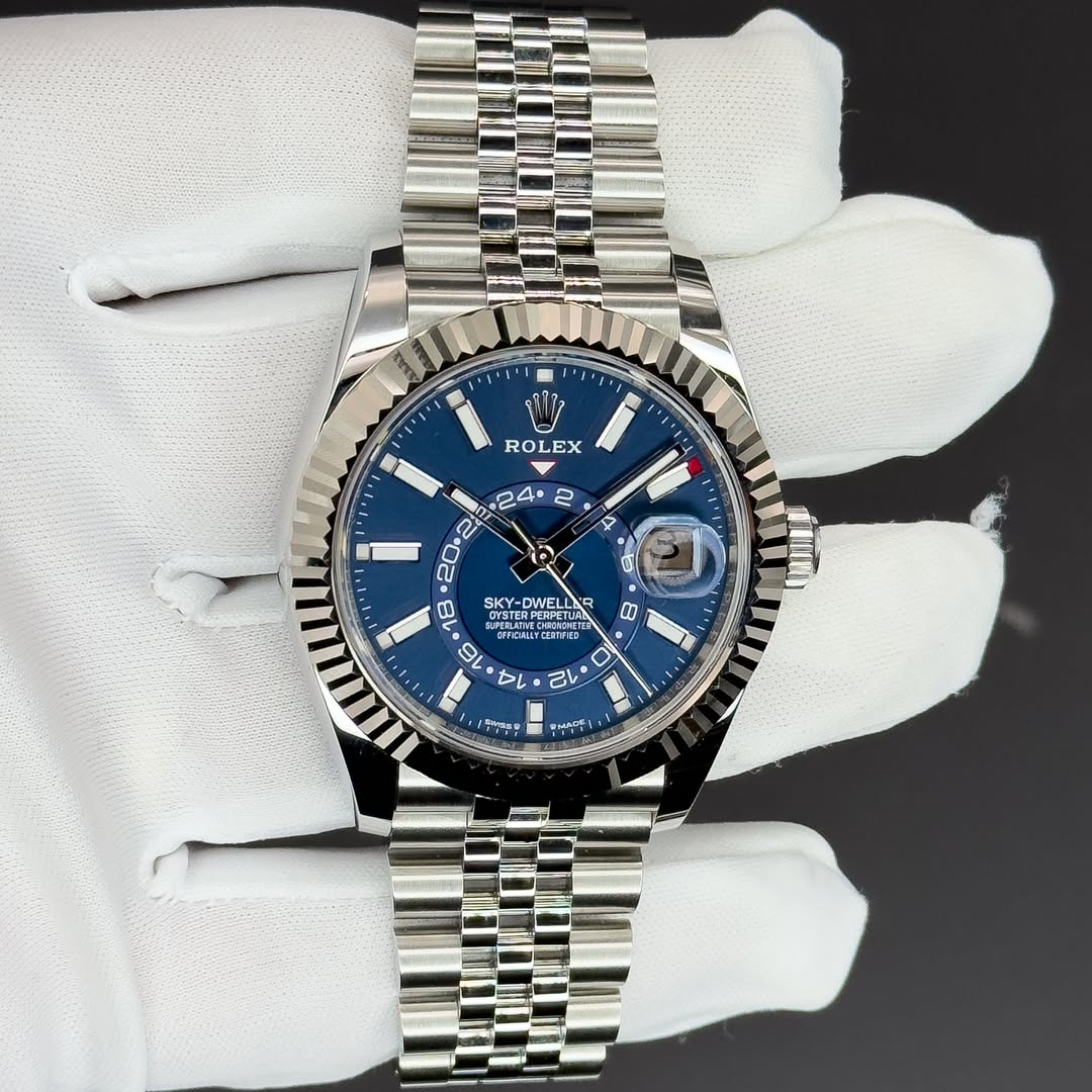 May be an image of wrist watch and text