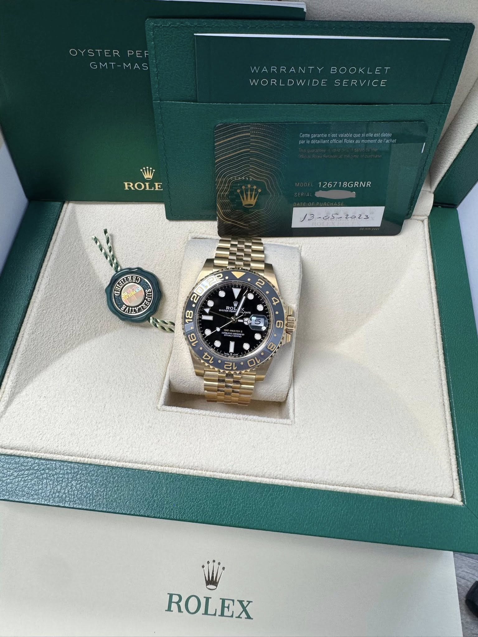 May be an image of wrist watch and text