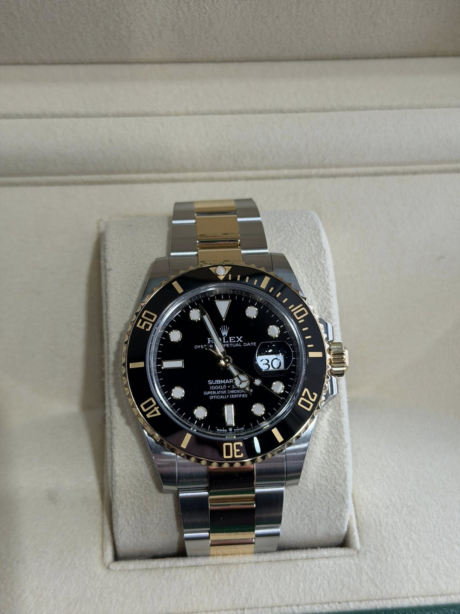 May be an image of wrist watch and text