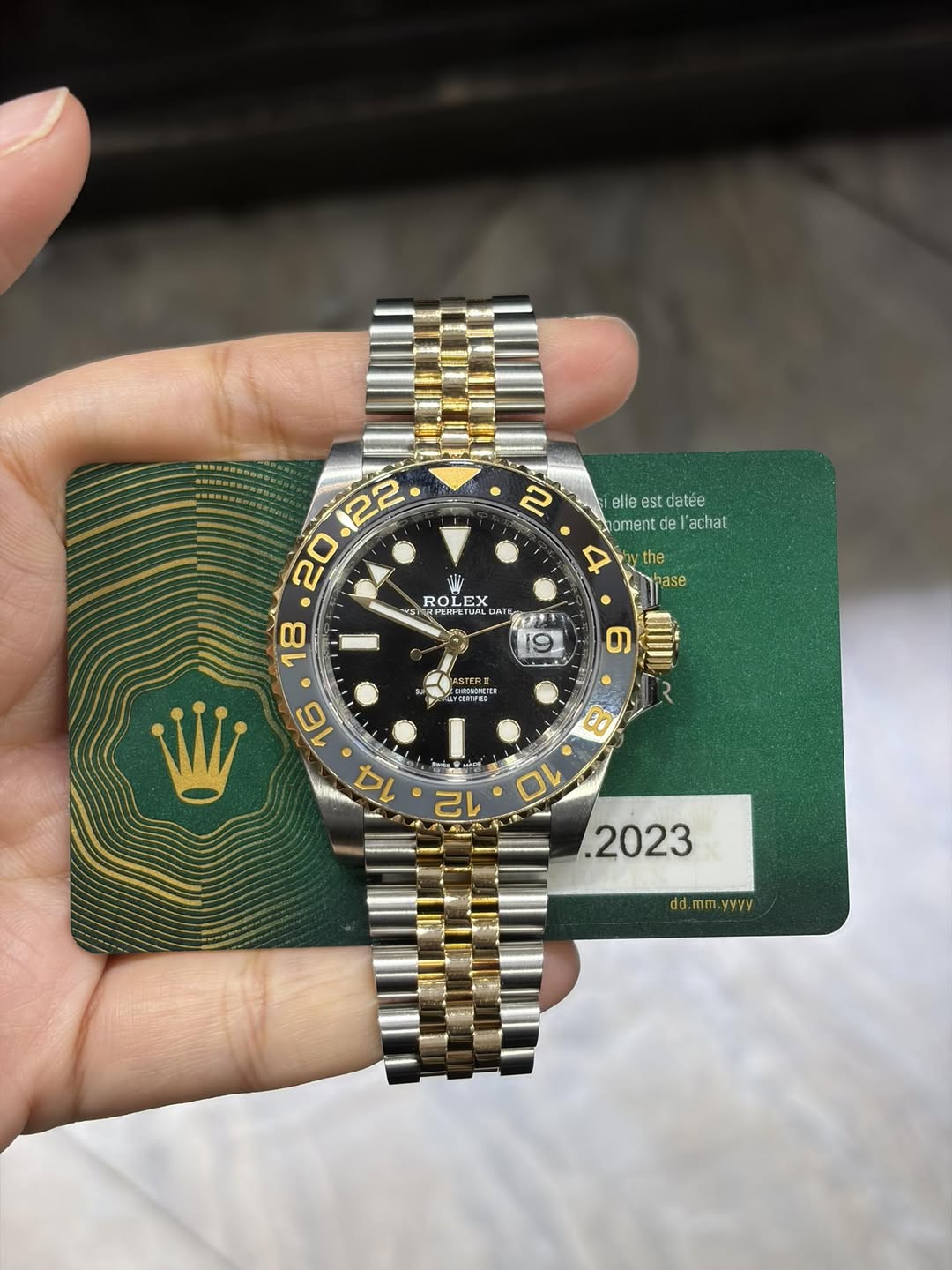 May be an image of wrist watch and text that says '2 elle st datée omen nentde1 td de elacha l'achat ROLEX STUAL ATE ま RO OL E the the pase ៣ា 한 dd.mm.yyyy yyyy'