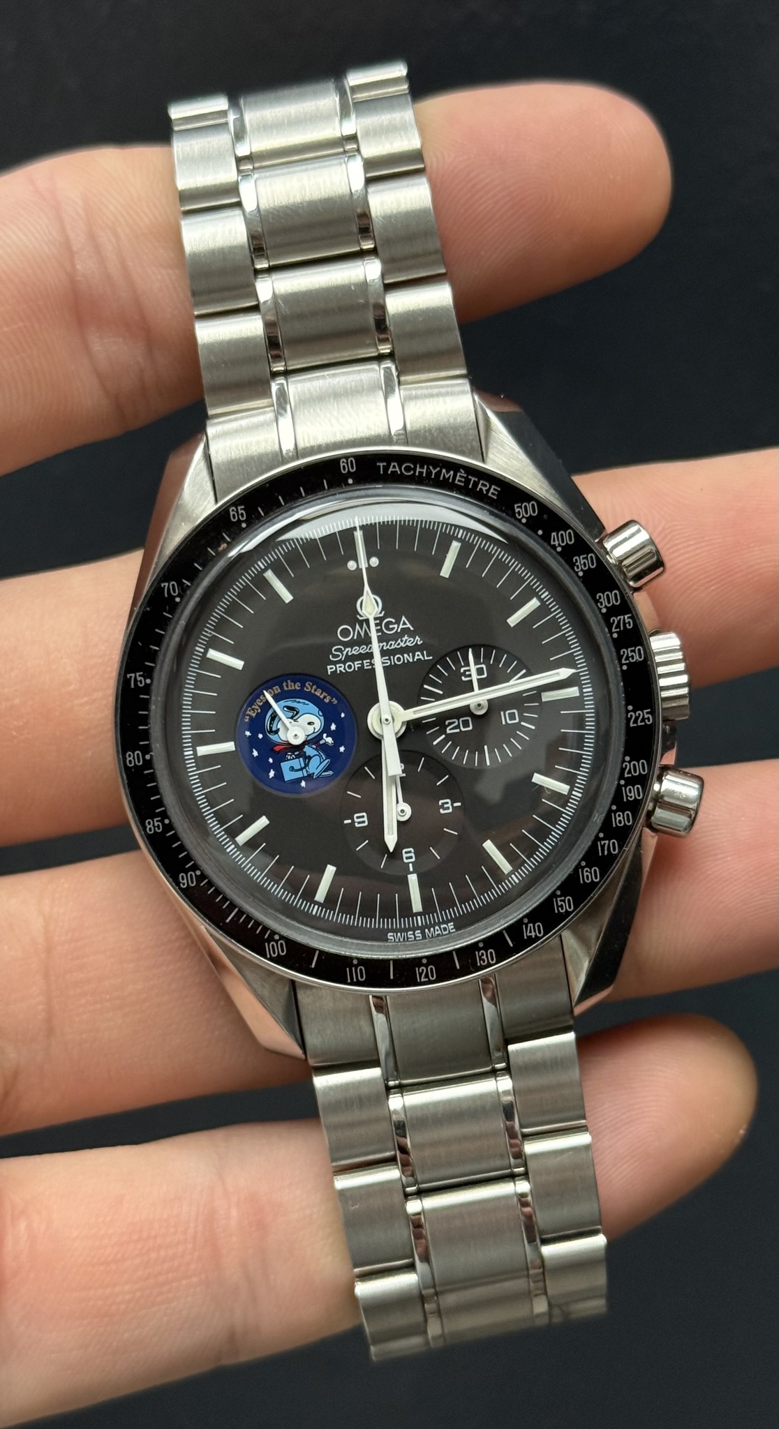 May be an image of wrist watch and text