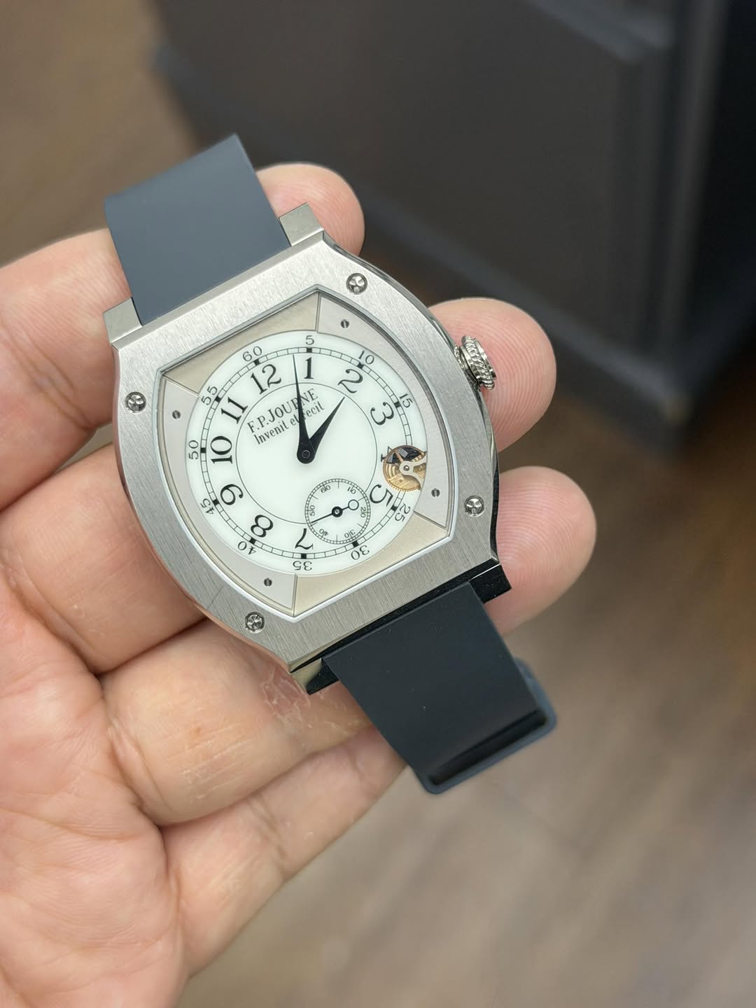 May be an image of wrist watch and text