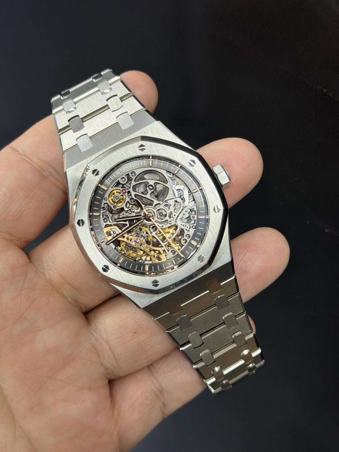 May be an image of wrist watch and text