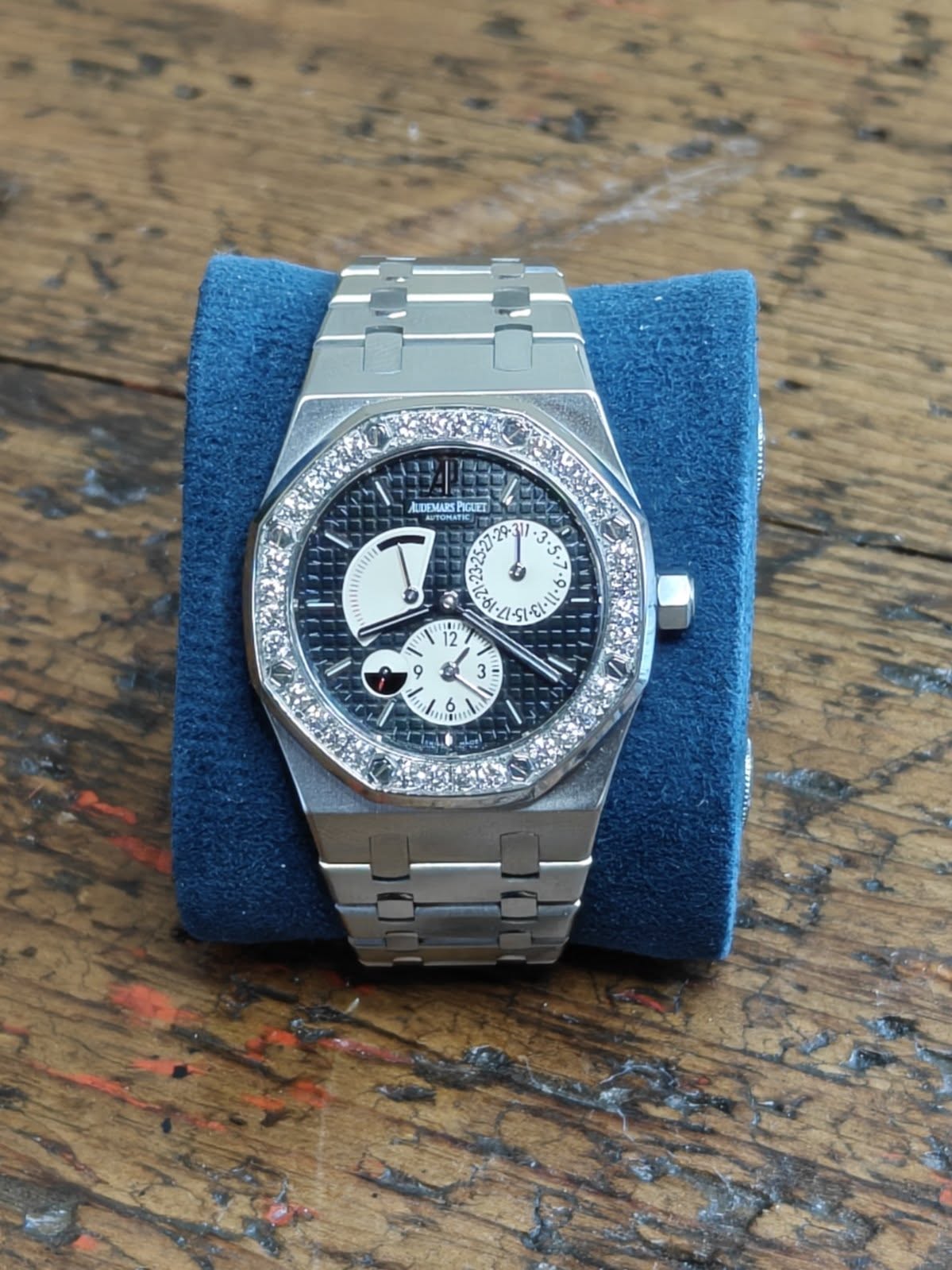 May be an image of wrist watch and text