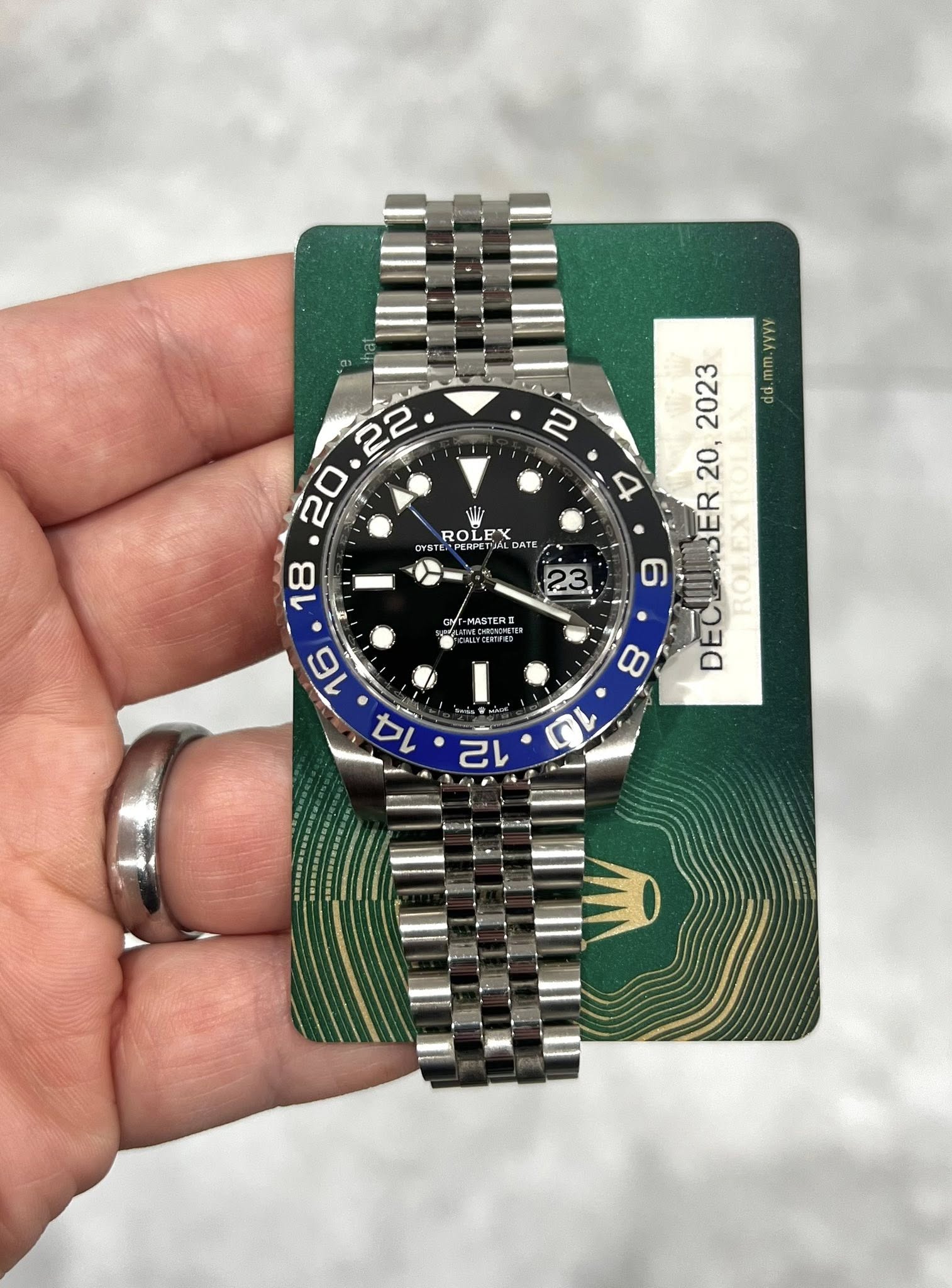 May be an image of wrist watch and text that says 'N ROL PERPETIA DATE mm.yyv AAA 2023 mm. da 20, ER 9 DECBER20 ROI 8 DECL 10 23 MASTERE ERE MASTE 12'