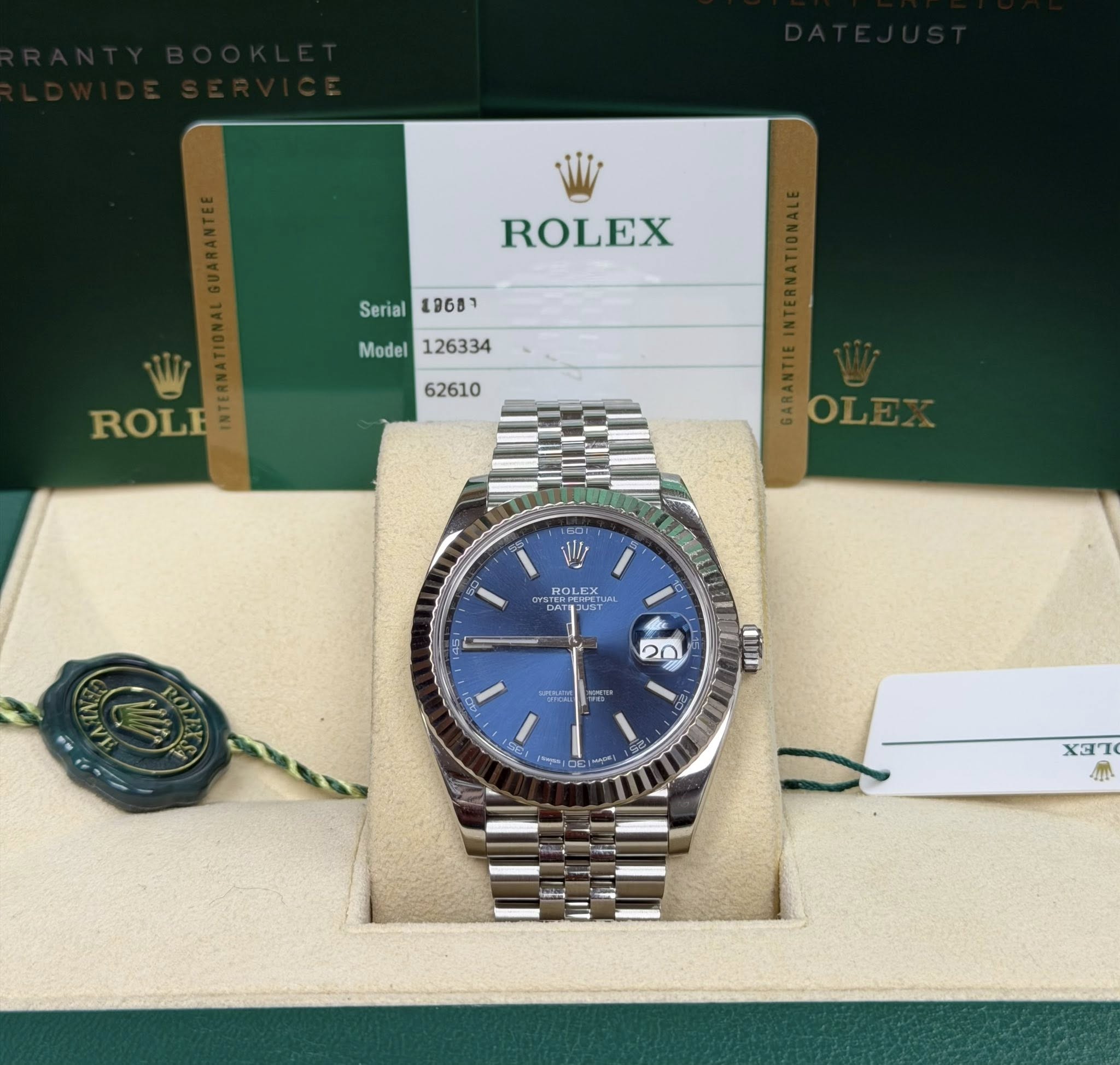 May be an image of wrist watch and text that says 'ROLEX Serial1868 Serial 19687 Model126334 Model ROLE ROLEX OLI LEX 2 20 သာ် លជ 1 אל XAT ብ'