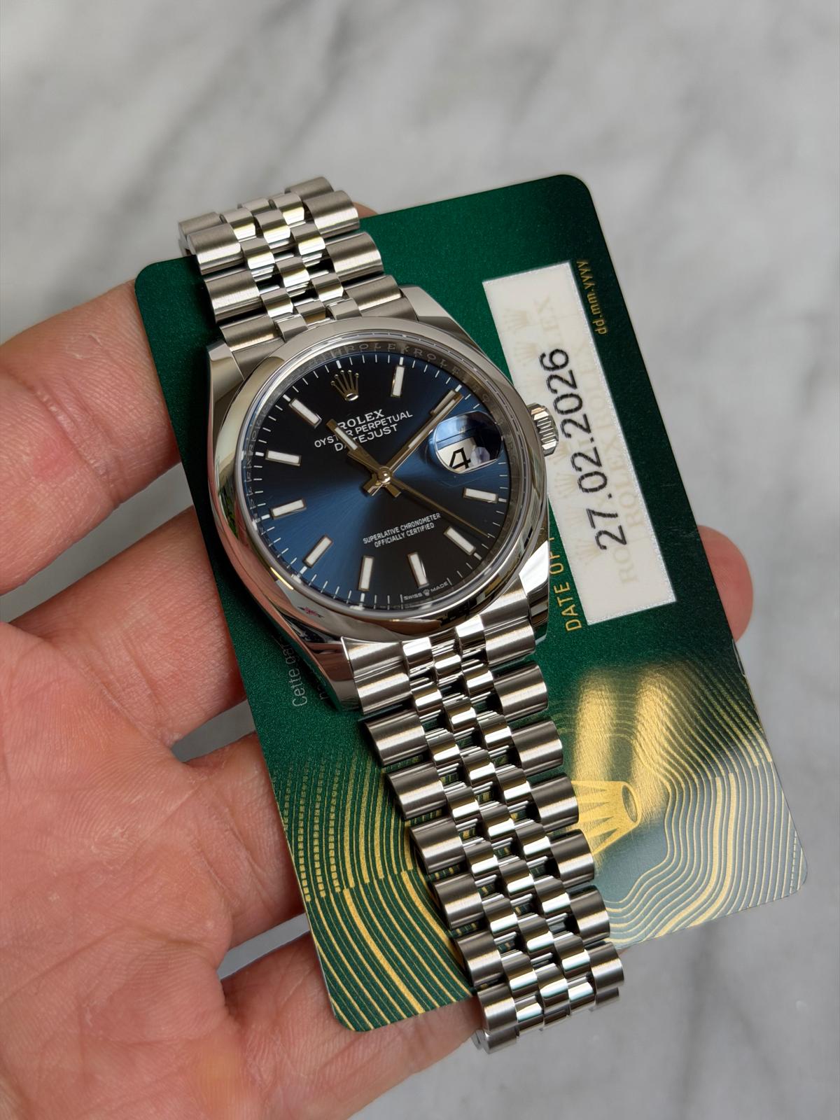 May be an image of wrist watch and text that says 'SPERPETI OLEX LEX PERPETUA LEXUP AL JUST D RPERICANL cEone thua 2026 02 UP DATE DA'