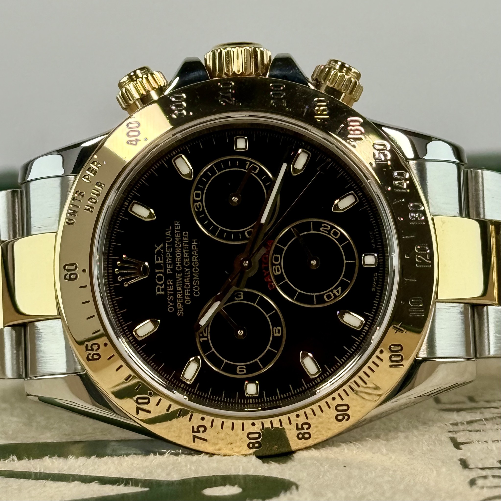 May be an image of wrist watch and text