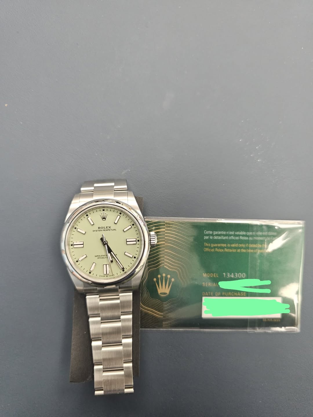 May be an image of wrist watch and text