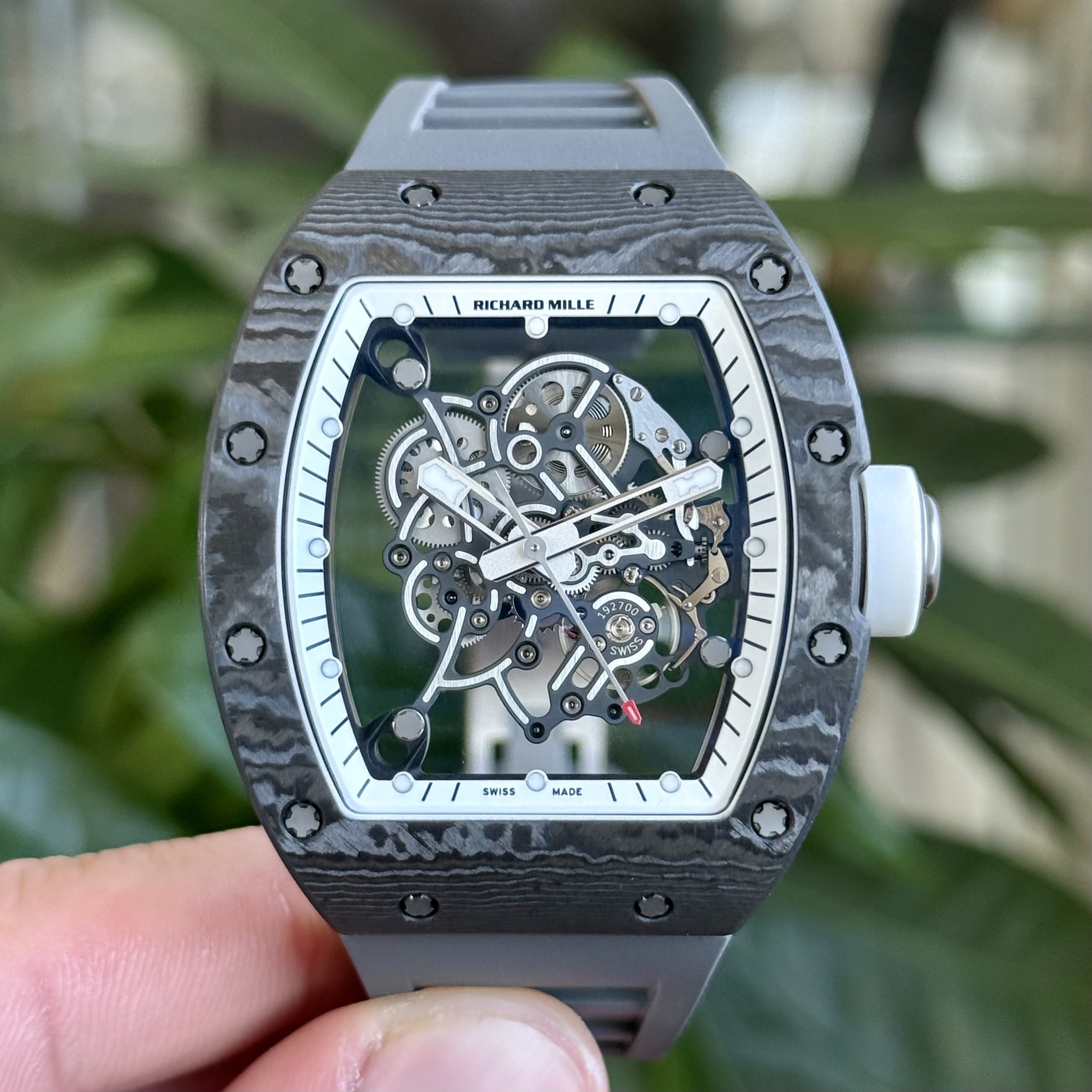 May be an image of wrist watch and text
