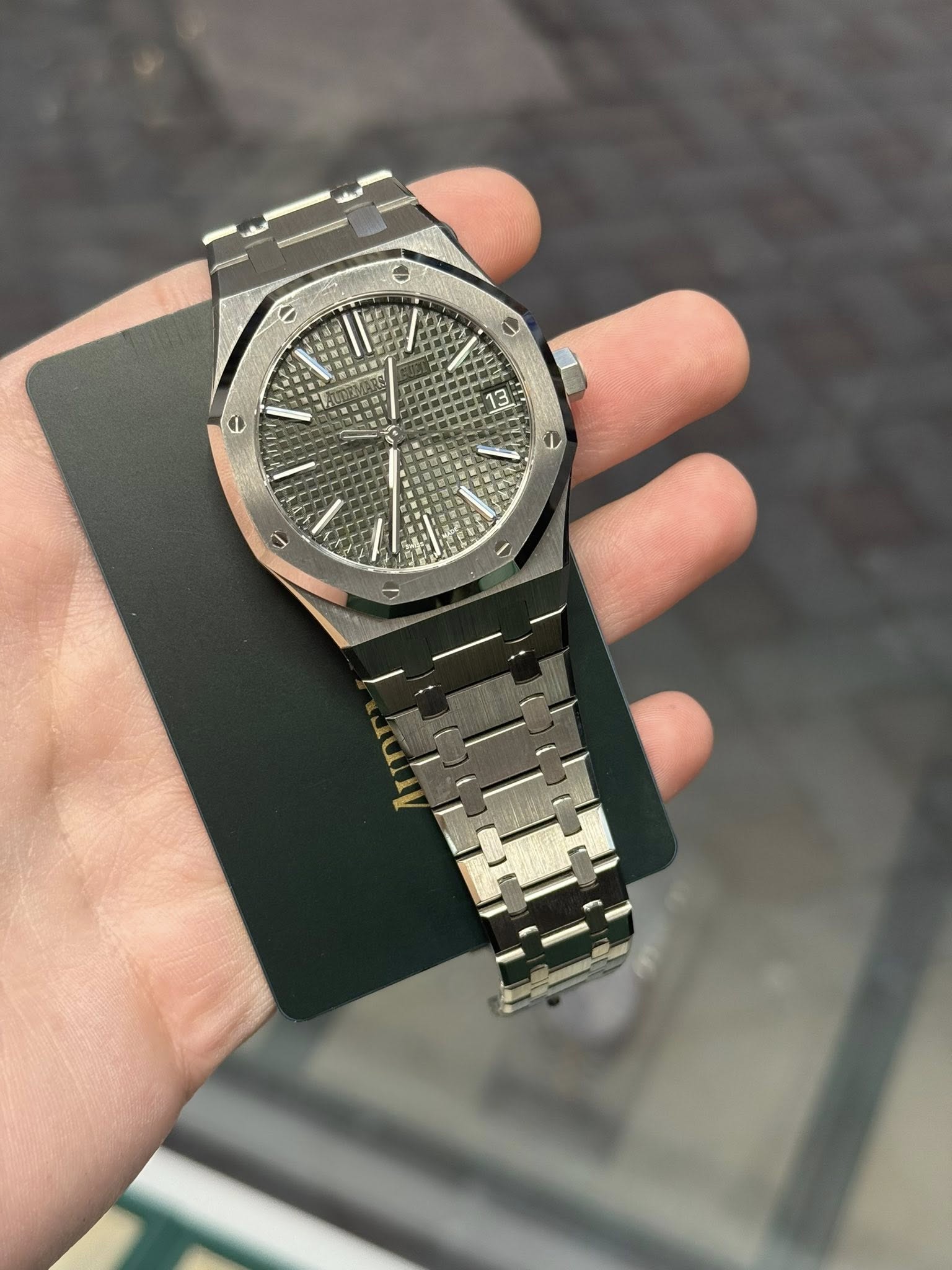 May be an image of wrist watch and text