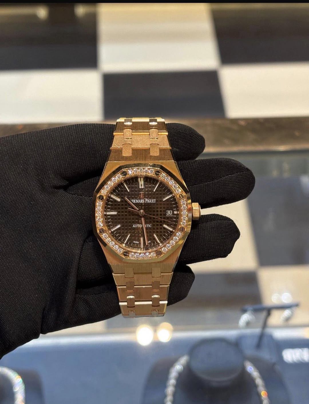 May be an image of wrist watch and text