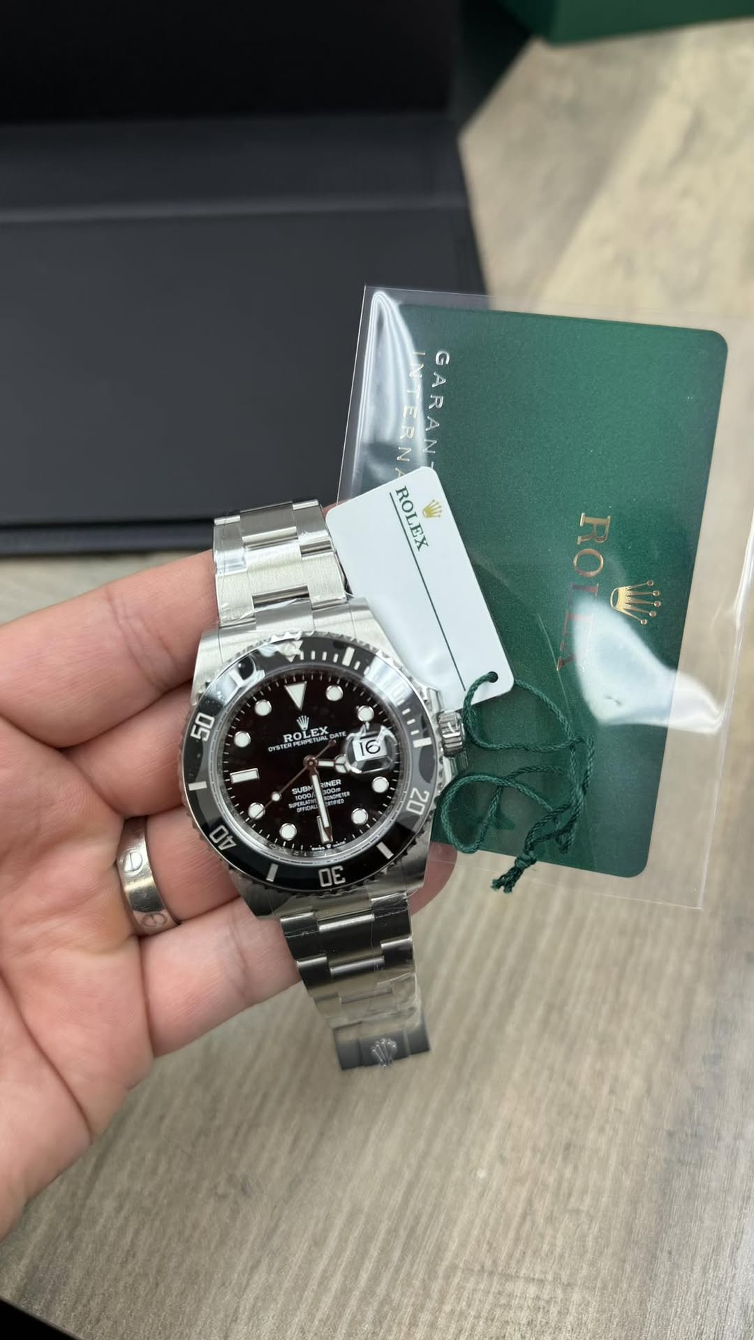 May be an image of wrist watch and text