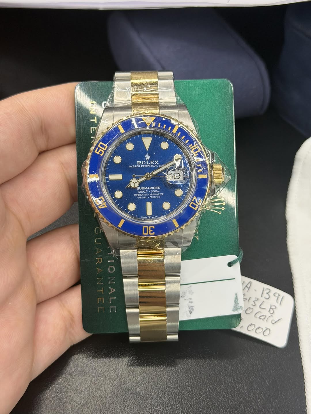 May be an image of wrist watch and text
