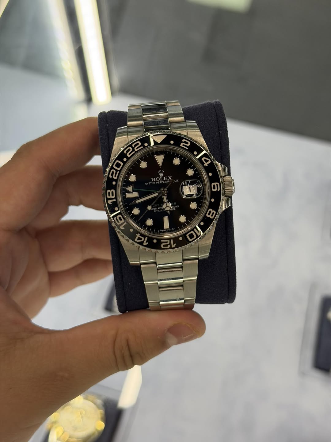 May be an image of wrist watch and text that says '20.22. ROLEX C'
