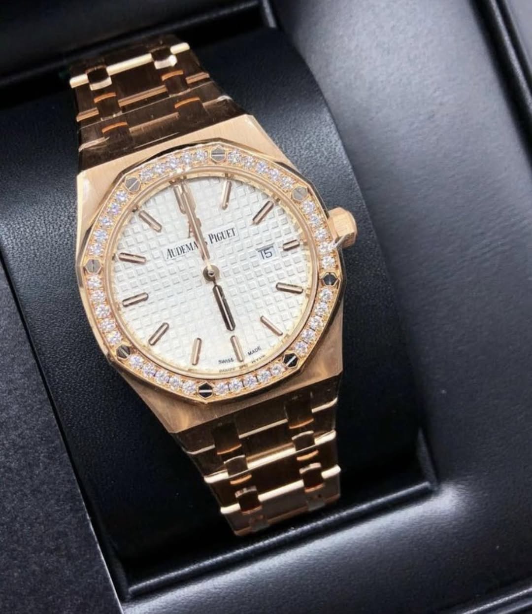 May be an image of wrist watch and text